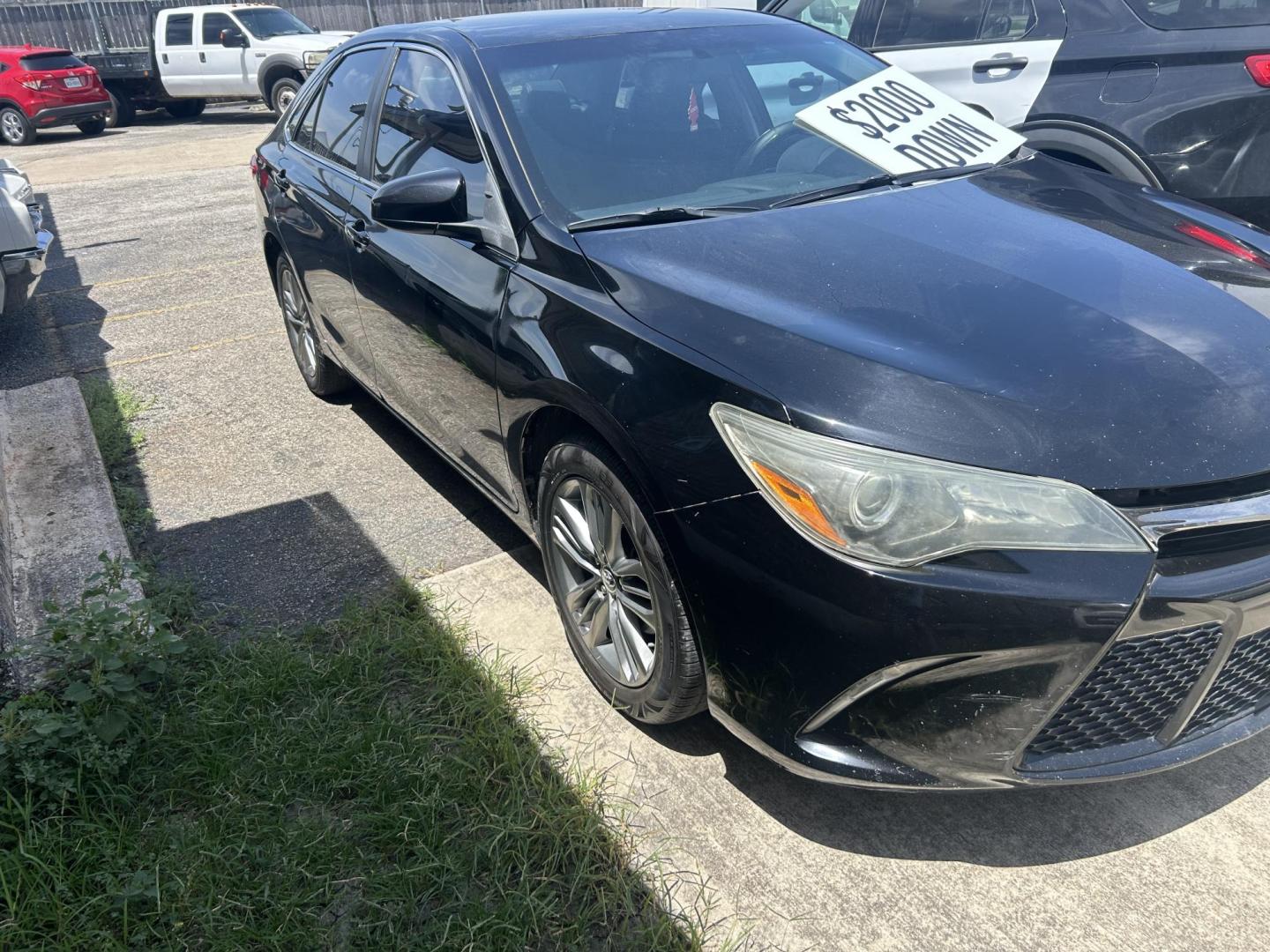 2016 Black Toyota Camry SE (4T1BF1FK6GU) with an 2.5L L4 DOHC 16V engine, 6-Speed Automatic transmission, located at 1687 Business 35 S, New Braunfels, TX, 78130, (830) 625-7159, 29.655487, -98.051491 - Photo#1