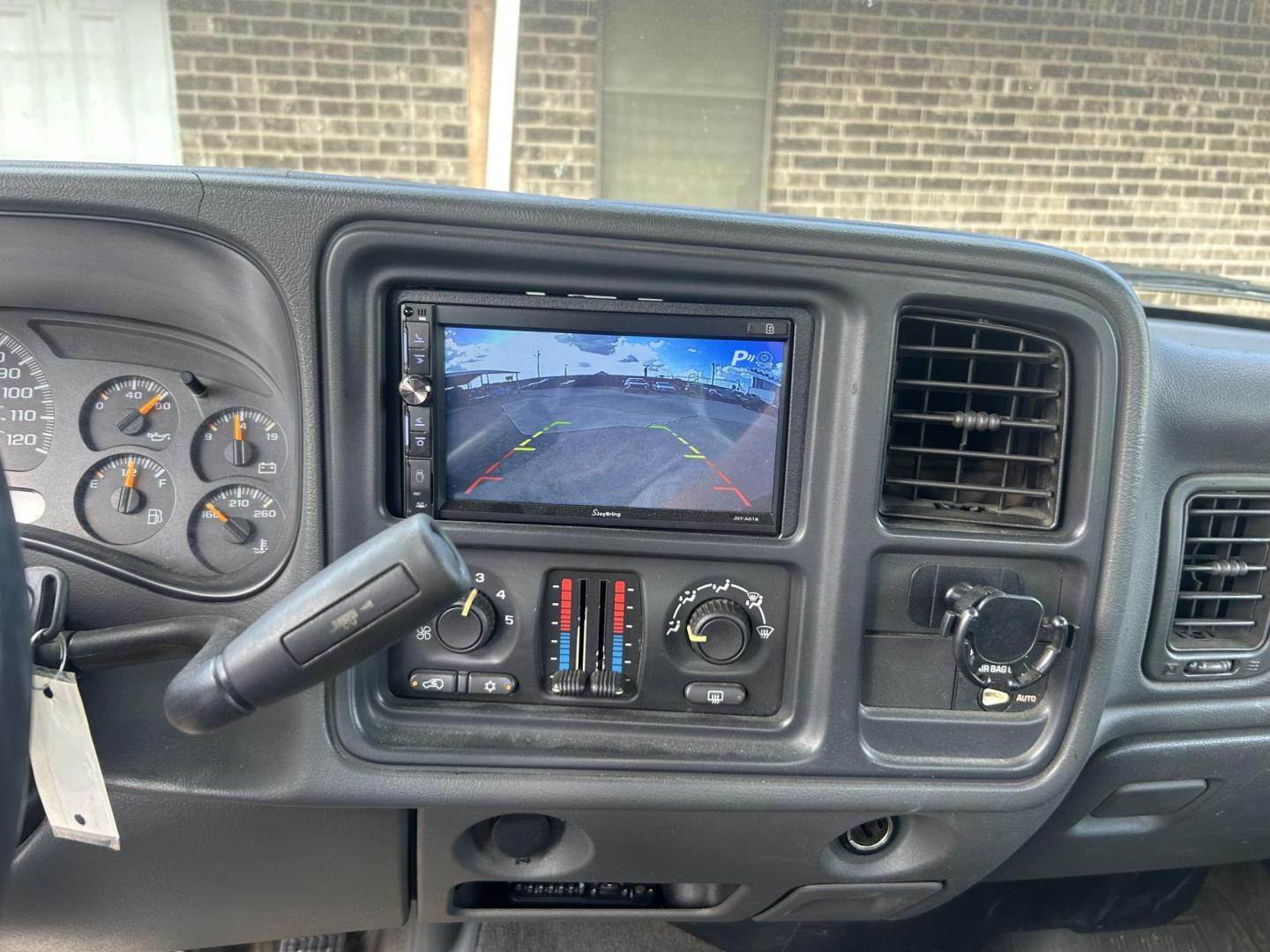 2003 Gray Chevrolet Silverado 1500 Ext. Cab Long Bed 2WD (2GCEC19V131) with an 4.8L V8 OHV 16V engine, 4-Speed Automatic Overdrive transmission, located at 1687 Business 35 S, New Braunfels, TX, 78130, (830) 625-7159, 29.655487, -98.051491 - Photo#9