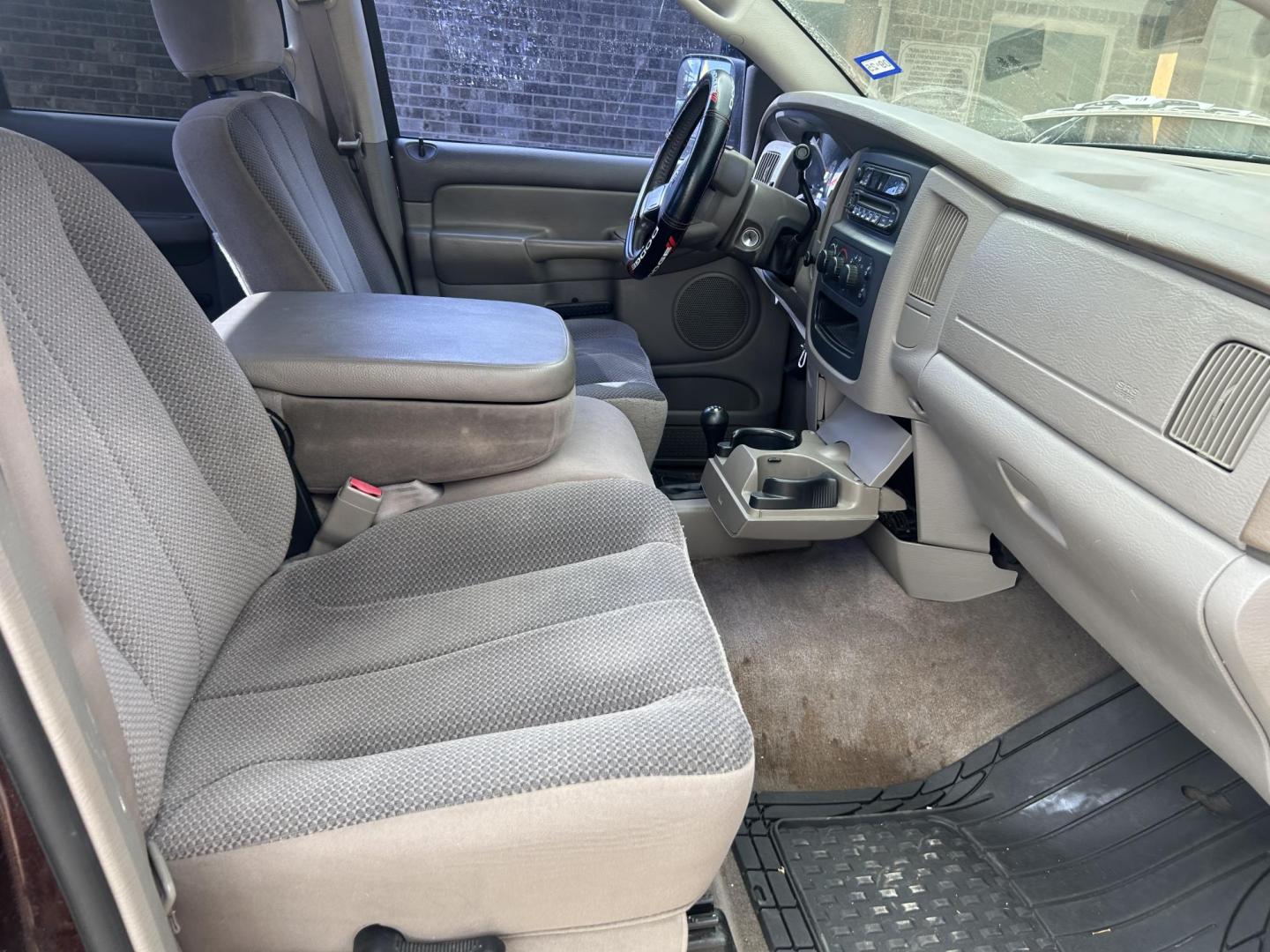 2004 Maroon Dodge Ram 2500 Laramie Quad Cab 4WD (3D7KU28C74G) with an 5.9L L6 OHV 24V TURBO DIESEL engine, located at 1687 Business 35 S, New Braunfels, TX, 78130, (830) 625-7159, 29.655487, -98.051491 - Photo#2