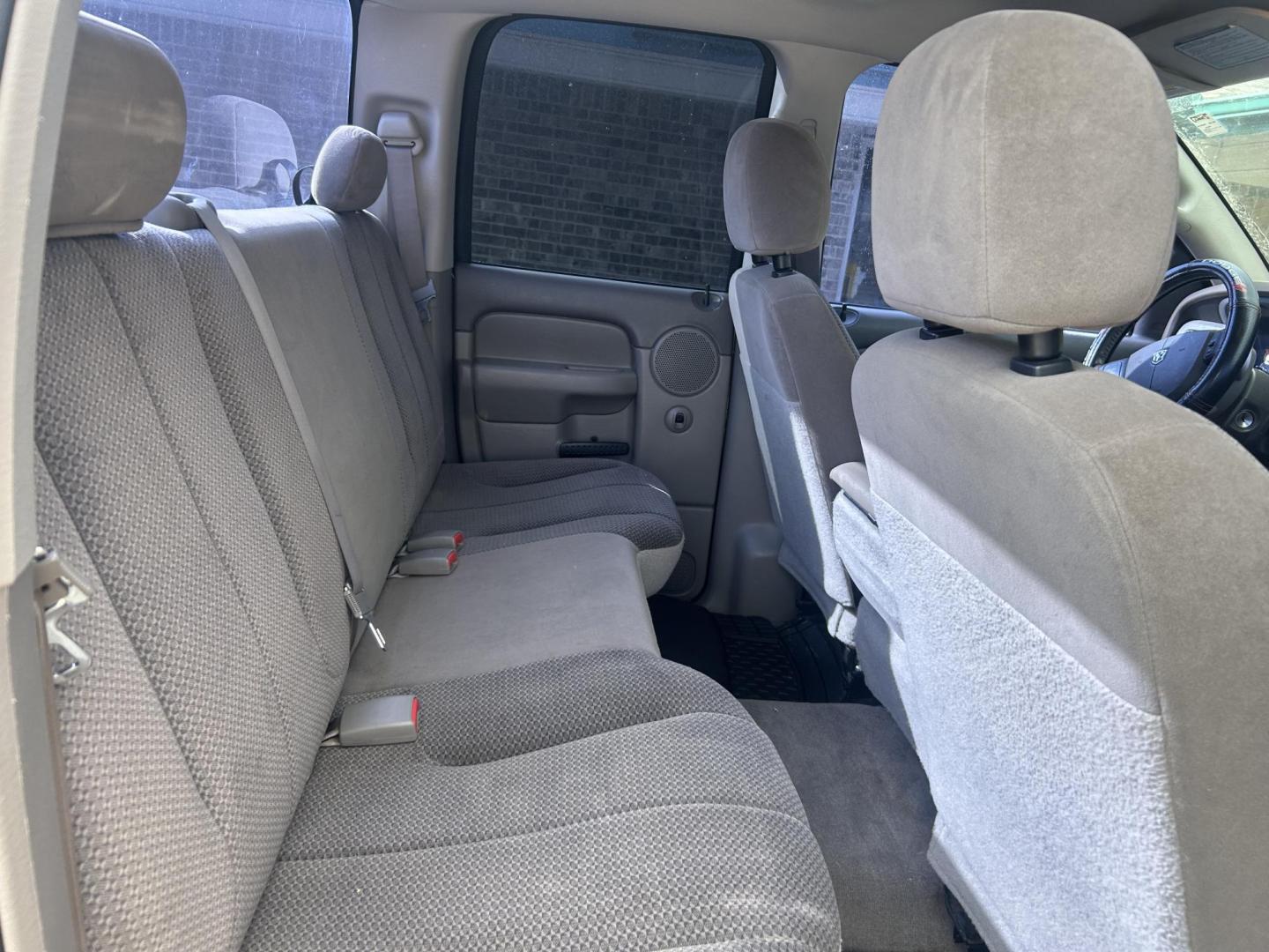2004 Maroon Dodge Ram 2500 Laramie Quad Cab 4WD (3D7KU28C74G) with an 5.9L L6 OHV 24V TURBO DIESEL engine, located at 1687 Business 35 S, New Braunfels, TX, 78130, (830) 625-7159, 29.655487, -98.051491 - Photo#4