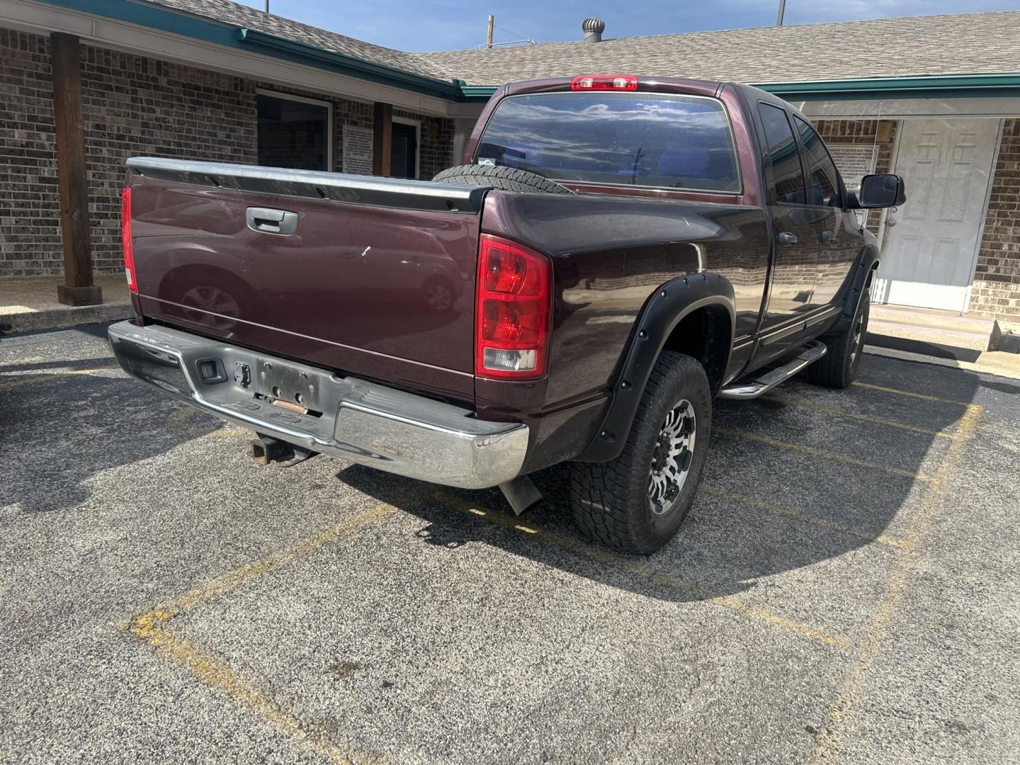 2004 Maroon Dodge Ram 2500 Laramie Quad Cab 4WD (3D7KU28C74G) with an 5.9L L6 OHV 24V TURBO DIESEL engine, located at 1687 Business 35 S, New Braunfels, TX, 78130, (830) 625-7159, 29.655487, -98.051491 - Photo#6