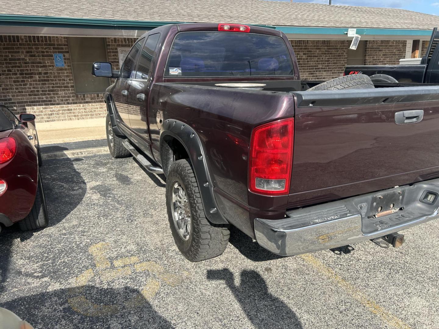 2004 Maroon Dodge Ram 2500 Laramie Quad Cab 4WD (3D7KU28C74G) with an 5.9L L6 OHV 24V TURBO DIESEL engine, located at 1687 Business 35 S, New Braunfels, TX, 78130, (830) 625-7159, 29.655487, -98.051491 - Photo#8