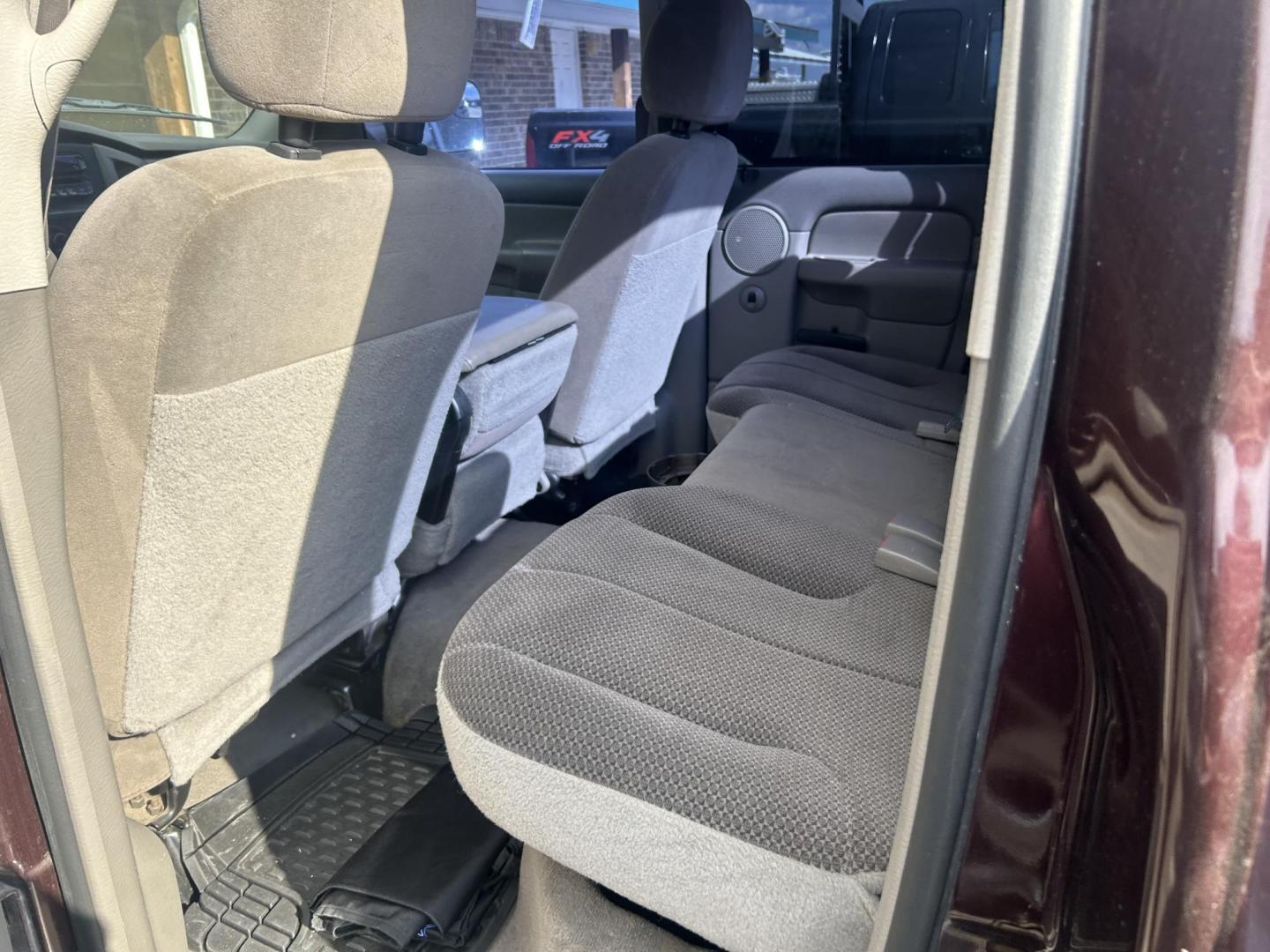 2004 Maroon Dodge Ram 2500 Laramie Quad Cab 4WD (3D7KU28C74G) with an 5.9L L6 OHV 24V TURBO DIESEL engine, located at 1687 Business 35 S, New Braunfels, TX, 78130, (830) 625-7159, 29.655487, -98.051491 - Photo#9