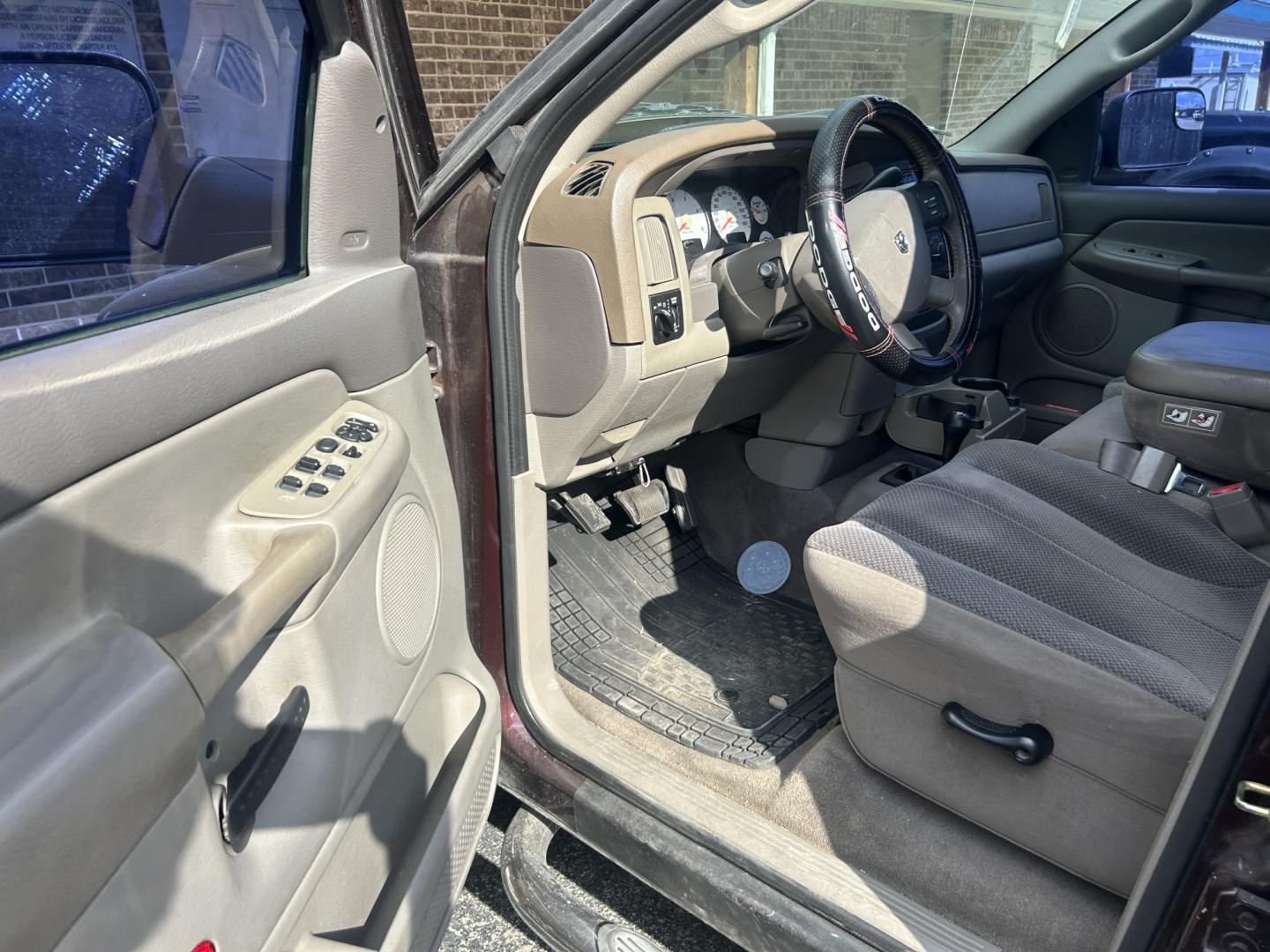 2004 Maroon Dodge Ram 2500 Laramie Quad Cab 4WD (3D7KU28C74G) with an 5.9L L6 OHV 24V TURBO DIESEL engine, located at 1687 Business 35 S, New Braunfels, TX, 78130, (830) 625-7159, 29.655487, -98.051491 - Photo#10