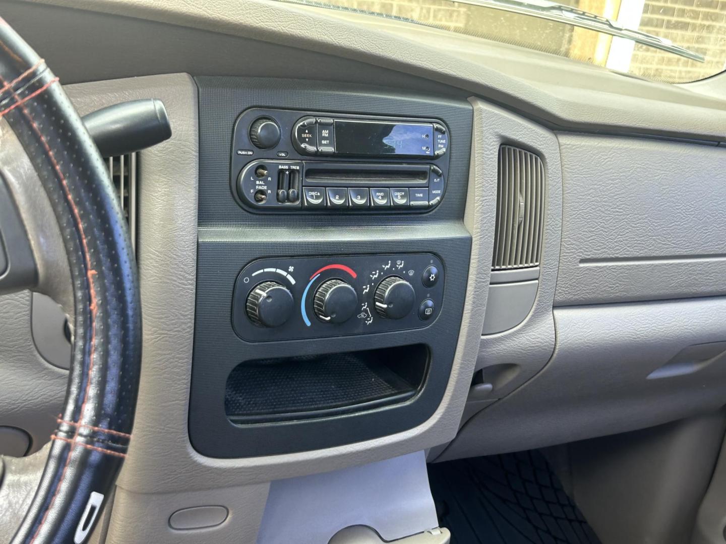 2004 Maroon Dodge Ram 2500 Laramie Quad Cab 4WD (3D7KU28C74G) with an 5.9L L6 OHV 24V TURBO DIESEL engine, located at 1687 Business 35 S, New Braunfels, TX, 78130, (830) 625-7159, 29.655487, -98.051491 - Photo#13