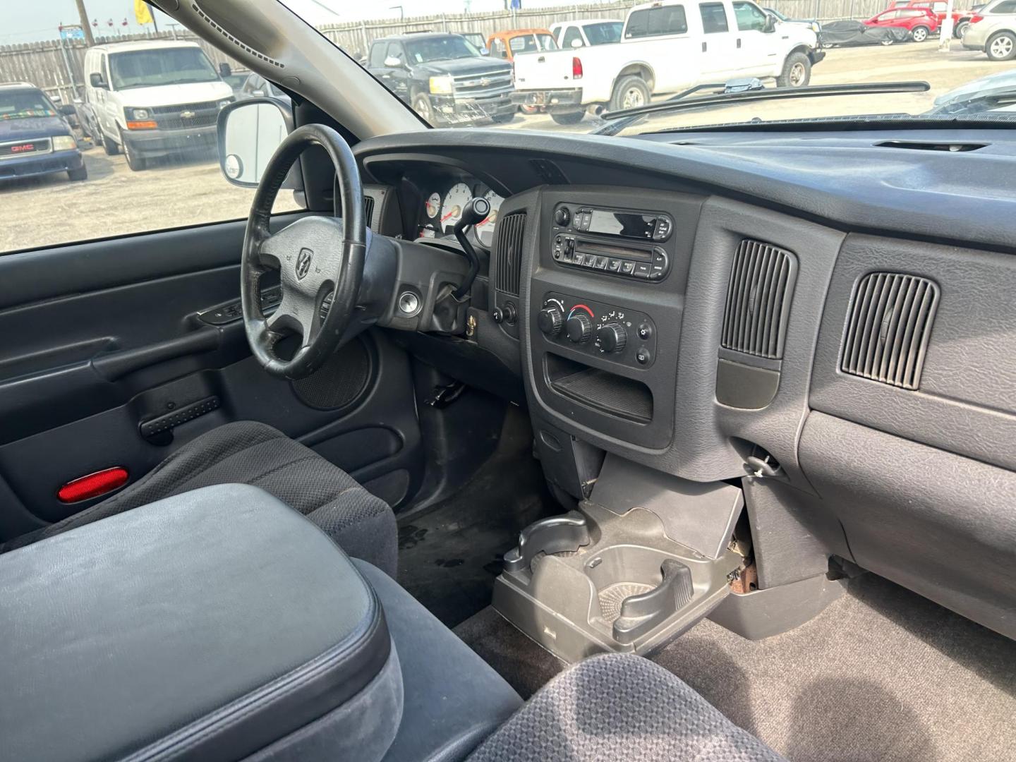2002 Silver Dodge Ram 1500 SLT Plus Quad Cab 2WD (1D7HA18N82S) with an 4.7L V8 SOHC 16V engine, Automatic transmission, located at 1687 Business 35 S, New Braunfels, TX, 78130, (830) 625-7159, 29.655487, -98.051491 - Photo#9