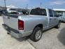 2002 Silver Dodge Ram 1500 SLT Plus Quad Cab 2WD (1D7HA18N82S) with an 4.7L V8 SOHC 16V engine, Automatic transmission, located at 1687 Business 35 S, New Braunfels, TX, 78130, (830) 625-7159, 29.655487, -98.051491 - Photo#2