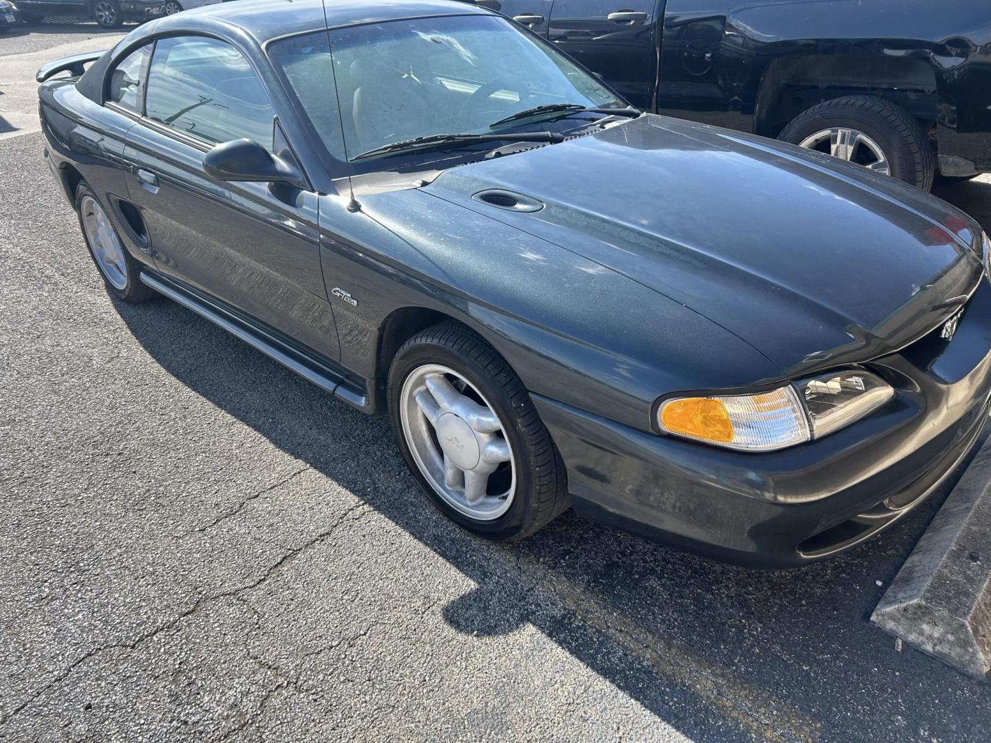 1998 Black Ford Mustang GT (1FAFP42X1WF) with an 4.6L V8 SOHC 16V engine, located at 1687 Business 35 S, New Braunfels, TX, 78130, (830) 625-7159, 29.655487, -98.051491 - Photo#3
