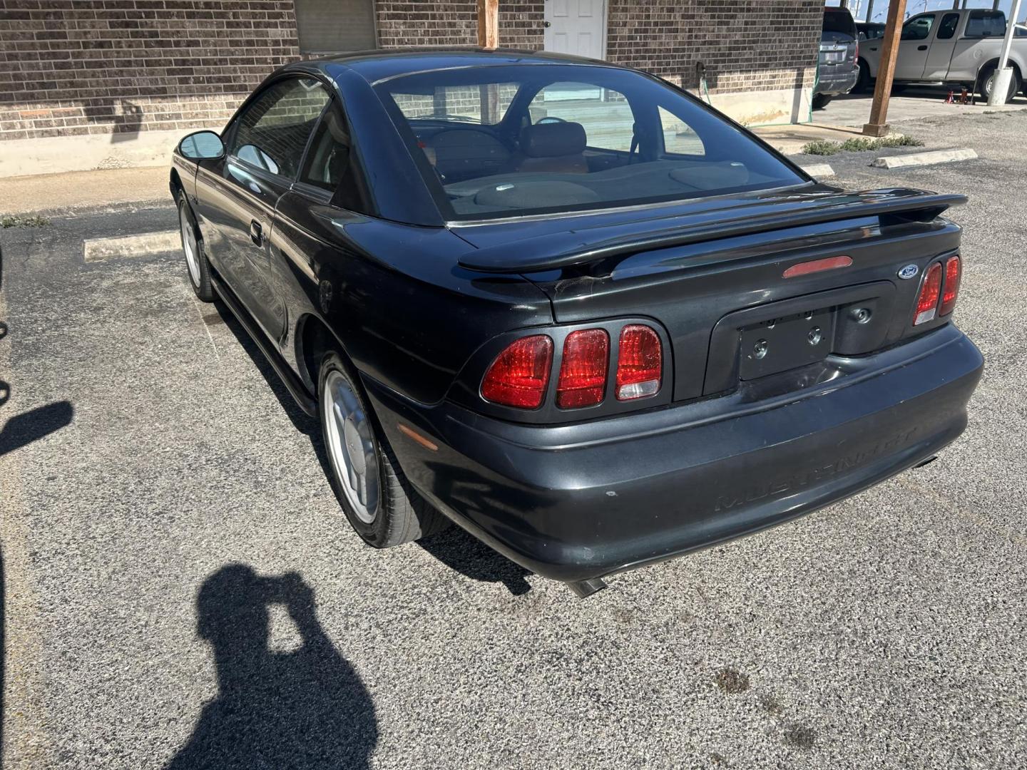 1998 Black Ford Mustang GT (1FAFP42X1WF) with an 4.6L V8 SOHC 16V engine, located at 1687 Business 35 S, New Braunfels, TX, 78130, (830) 625-7159, 29.655487, -98.051491 - Photo#1