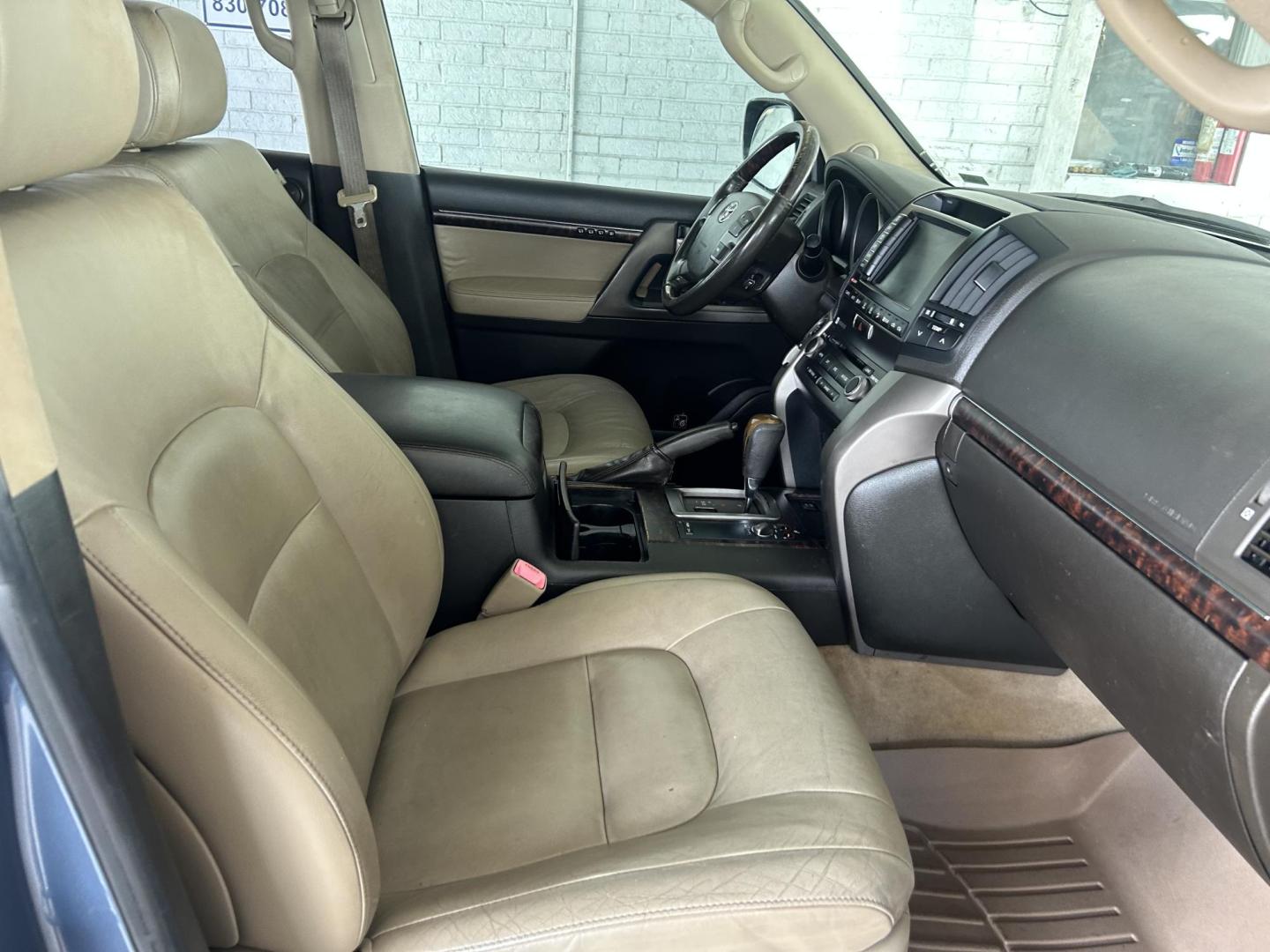 2010 Blue /Tan Toyota Land Cruiser 4WD (JTMHY7AJ0A5) with an 5.7L V8 DOHC 32V engine, 6-Speed Automatic transmission, located at 1687 Business 35 S, New Braunfels, TX, 78130, (830) 625-7159, 29.655487, -98.051491 - Photo#2