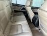2010 Blue /Tan Toyota Land Cruiser 4WD (JTMHY7AJ0A5) with an 5.7L V8 DOHC 32V engine, 6-Speed Automatic transmission, located at 1687 Business 35 S, New Braunfels, TX, 78130, (830) 625-7159, 29.655487, -98.051491 - Photo#4