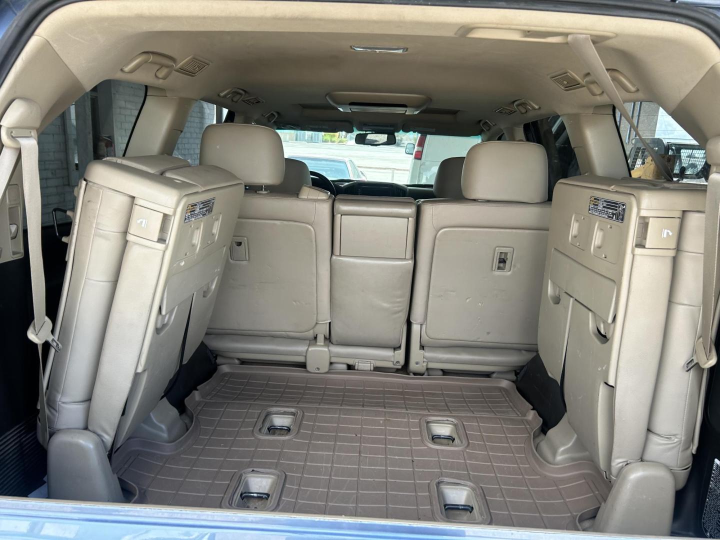 2010 Blue /Tan Toyota Land Cruiser 4WD (JTMHY7AJ0A5) with an 5.7L V8 DOHC 32V engine, 6-Speed Automatic transmission, located at 1687 Business 35 S, New Braunfels, TX, 78130, (830) 625-7159, 29.655487, -98.051491 - Photo#7