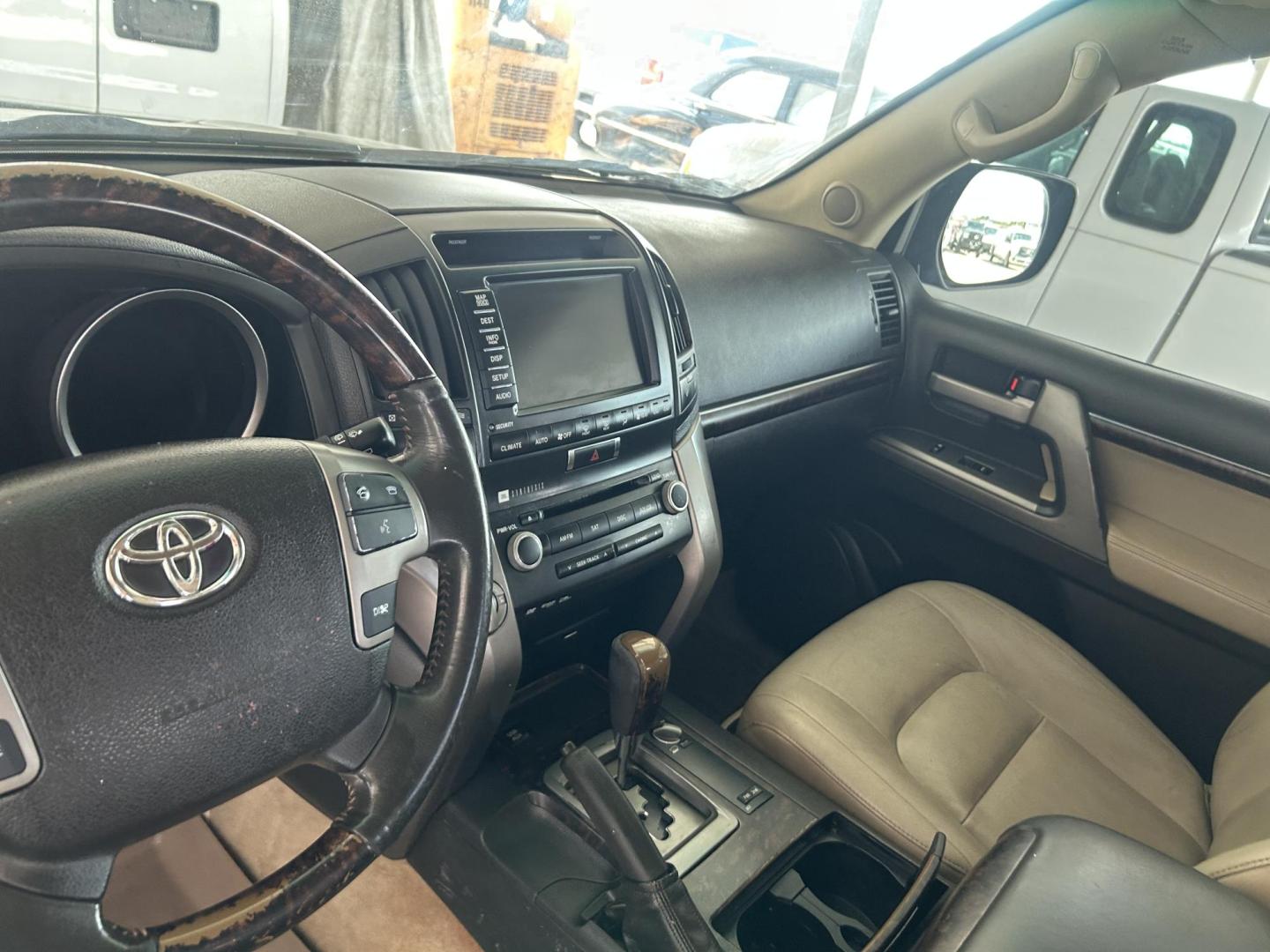 2010 Blue /Tan Toyota Land Cruiser 4WD (JTMHY7AJ0A5) with an 5.7L V8 DOHC 32V engine, 6-Speed Automatic transmission, located at 1687 Business 35 S, New Braunfels, TX, 78130, (830) 625-7159, 29.655487, -98.051491 - Photo#12