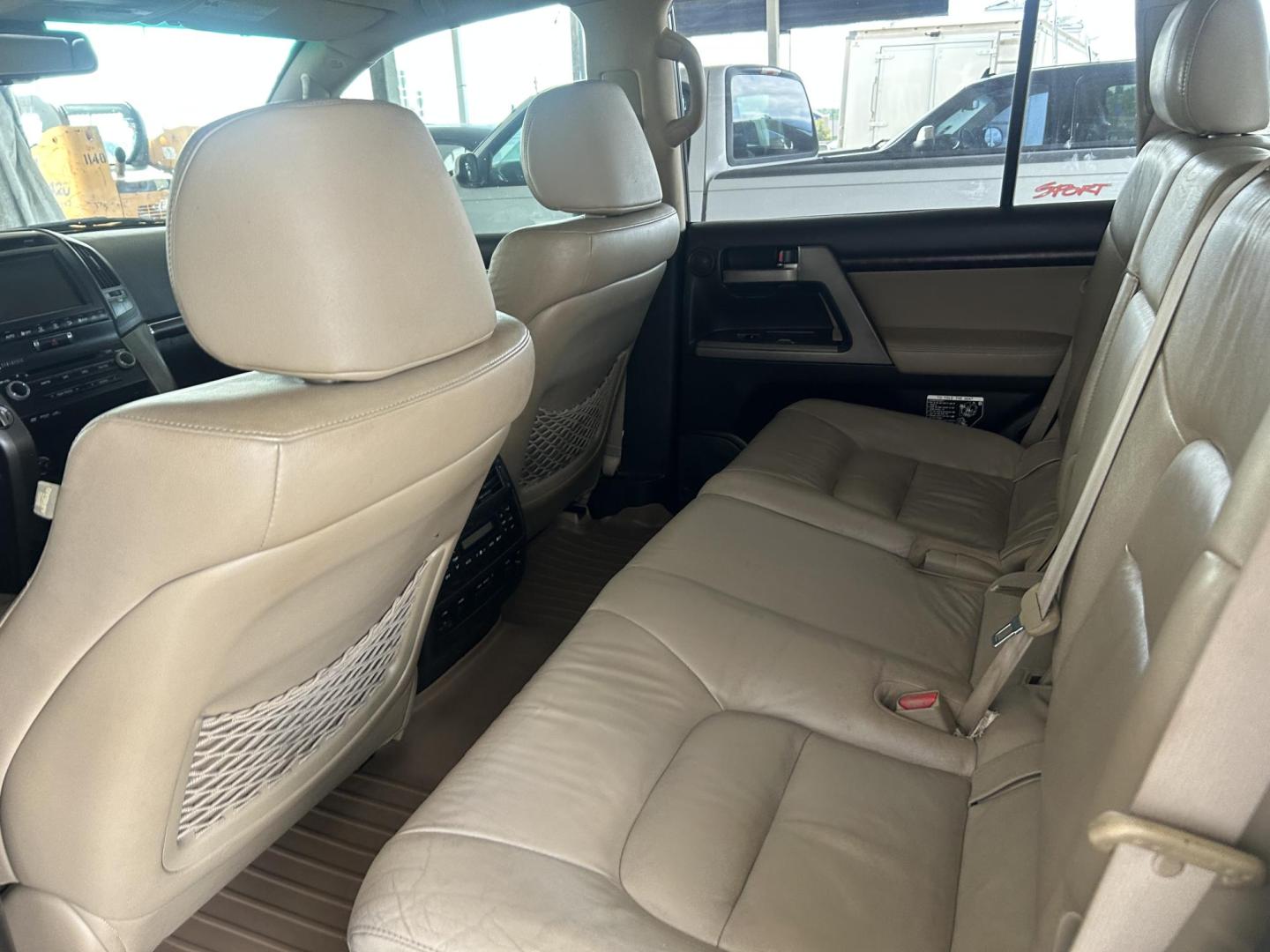2010 Blue /Tan Toyota Land Cruiser 4WD (JTMHY7AJ0A5) with an 5.7L V8 DOHC 32V engine, 6-Speed Automatic transmission, located at 1687 Business 35 S, New Braunfels, TX, 78130, (830) 625-7159, 29.655487, -98.051491 - Photo#9