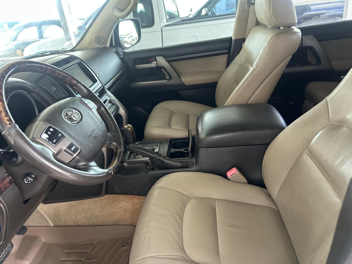 2010 Blue /Tan Toyota Land Cruiser 4WD (JTMHY7AJ0A5) with an 5.7L V8 DOHC 32V engine, 6-Speed Automatic transmission, located at 1687 Business 35 S, New Braunfels, TX, 78130, (830) 625-7159, 29.655487, -98.051491 - Photo#11