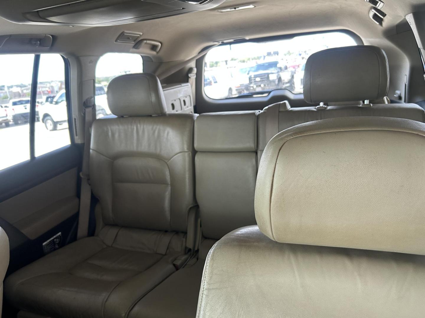2010 Blue /Tan Toyota Land Cruiser 4WD (JTMHY7AJ0A5) with an 5.7L V8 DOHC 32V engine, 6-Speed Automatic transmission, located at 1687 Business 35 S, New Braunfels, TX, 78130, (830) 625-7159, 29.655487, -98.051491 - Photo#13