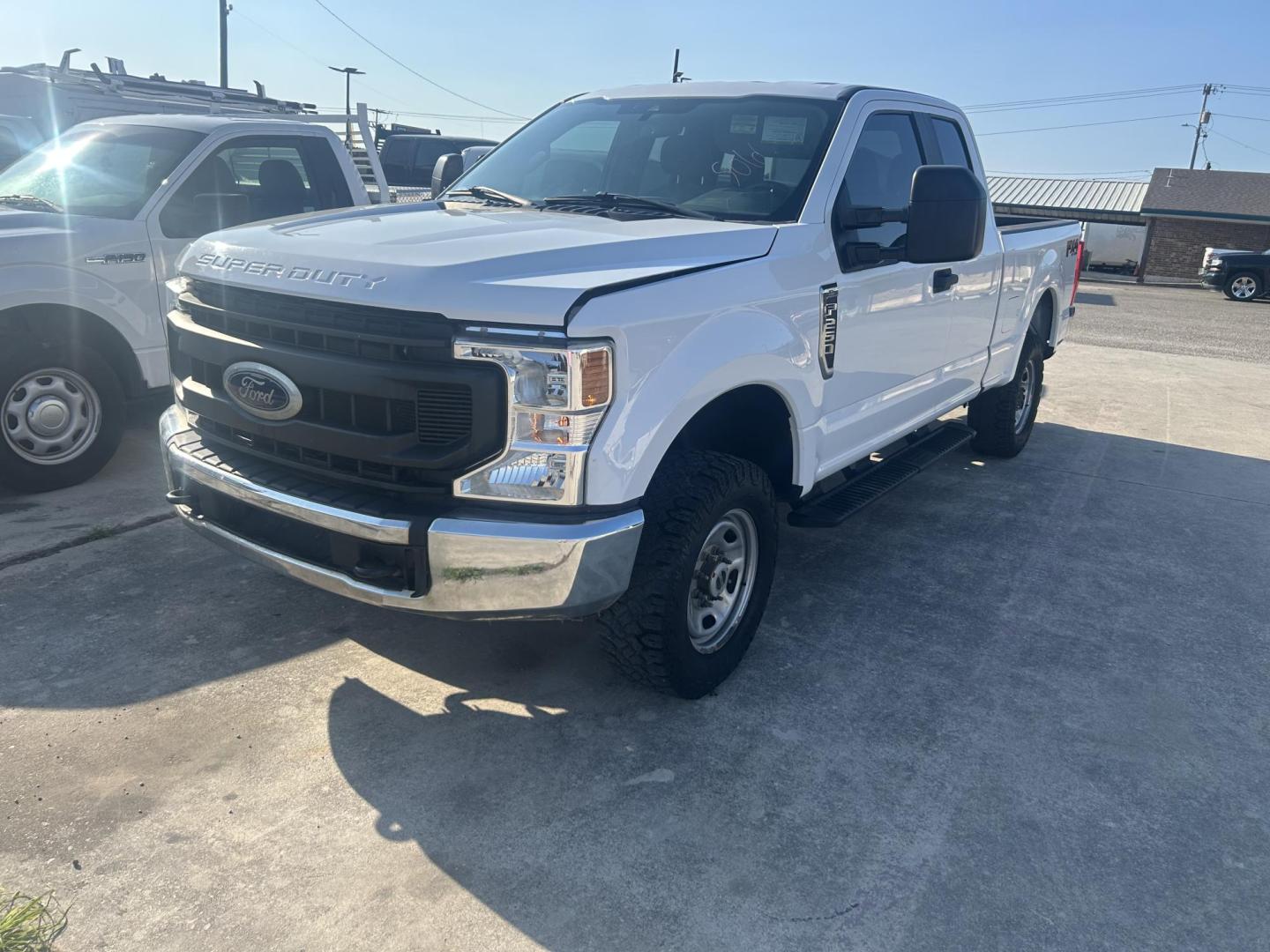 2021 White Ford F-250 SD XLT SuperCab Long Bed 4WD (1FT7X2B69ME) with an 6.2L V8 OHV 16V engine, 6A transmission, located at 1687 Business 35 S, New Braunfels, TX, 78130, (830) 625-7159, 29.655487, -98.051491 - Photo#0