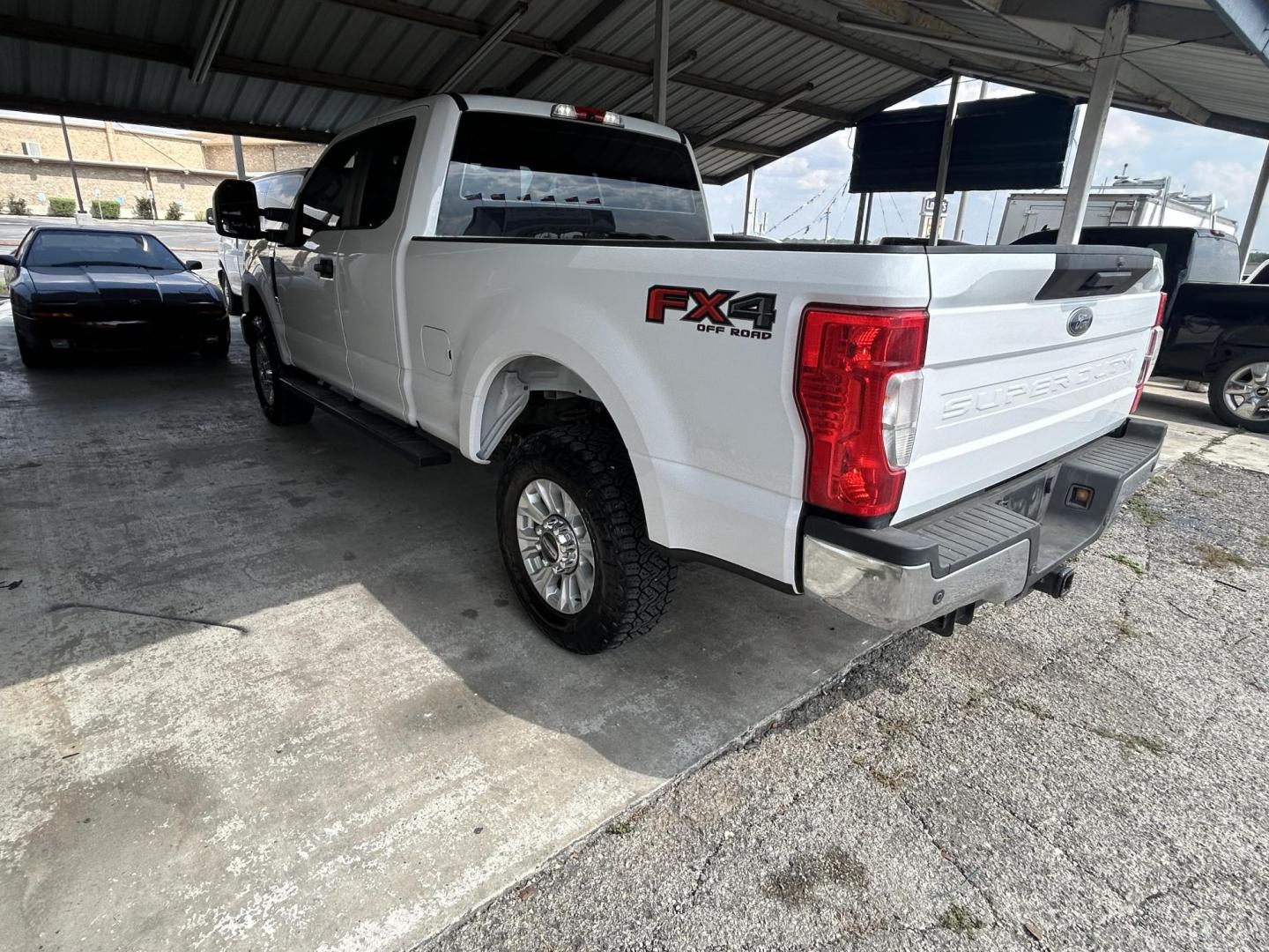 2021 White Ford F-250 SD XLT SuperCab Long Bed 4WD (1FT7X2B69ME) with an 6.2L V8 OHV 16V engine, 6A transmission, located at 1687 Business 35 S, New Braunfels, TX, 78130, (830) 625-7159, 29.655487, -98.051491 - Photo#1