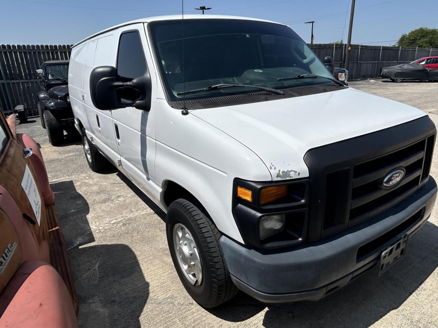 2011 Ford E-Series Van E-150 (1FTNE1EW9BD) with an 4.6L V8 SOHC 16V engine, 4-Speed Automatic transmission, located at 1687 Business 35 S, New Braunfels, TX, 78130, (830) 625-7159, 29.655487, -98.051491 - Photo#1