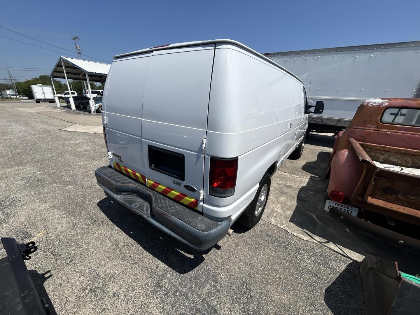 2011 Ford E-Series Van E-150 (1FTNE1EW9BD) with an 4.6L V8 SOHC 16V engine, 4-Speed Automatic transmission, located at 1687 Business 35 S, New Braunfels, TX, 78130, (830) 625-7159, 29.655487, -98.051491 - Photo#5