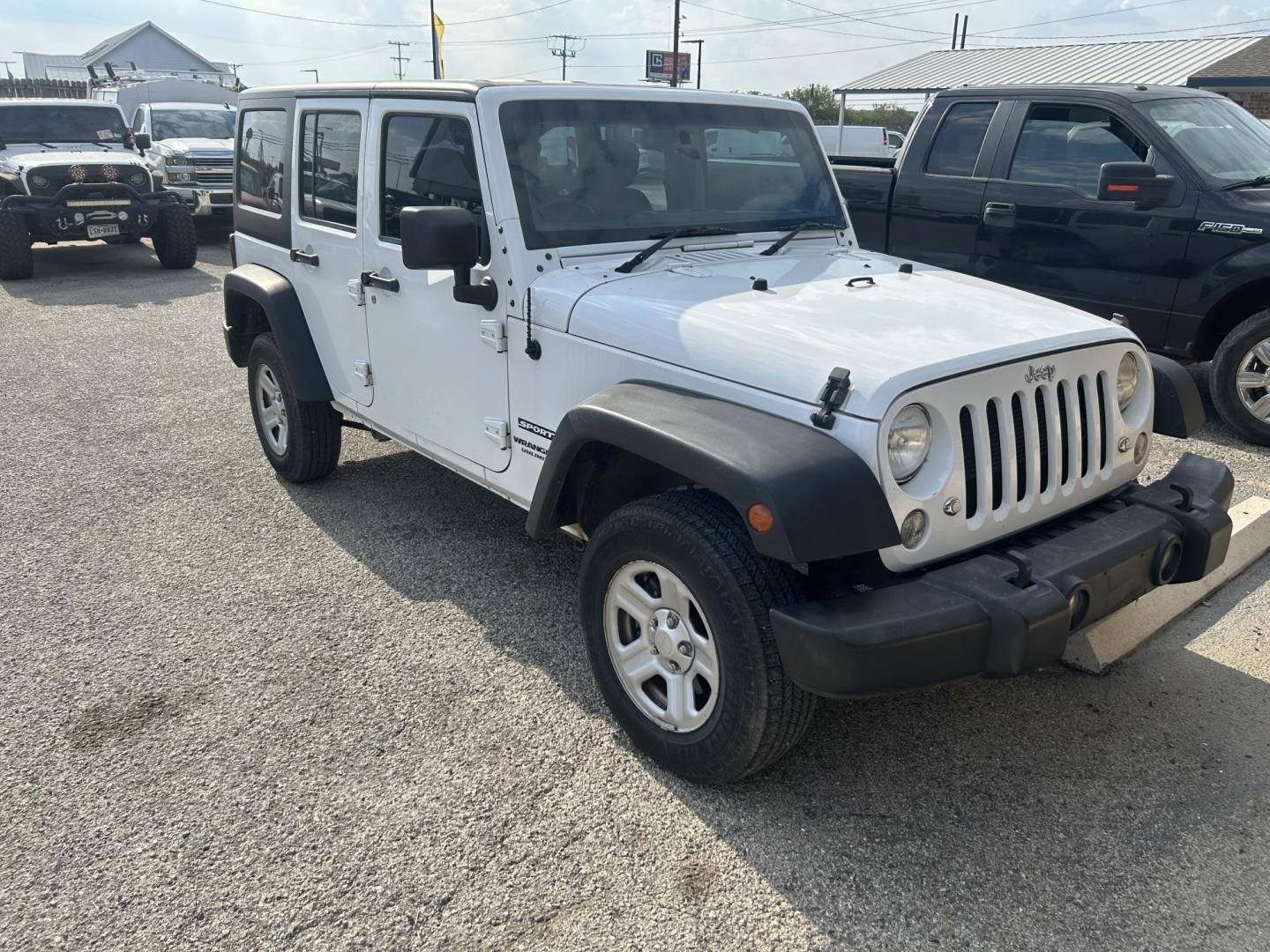 2017 White Jeep Wrangler Unlimited Sport 4WD RHD (1C4BJWKG6HL) with an 3.6L V6 DOHC 24V FFV engine, located at 1687 Business 35 S, New Braunfels, TX, 78130, (830) 625-7159, 29.655487, -98.051491 - Photo#0