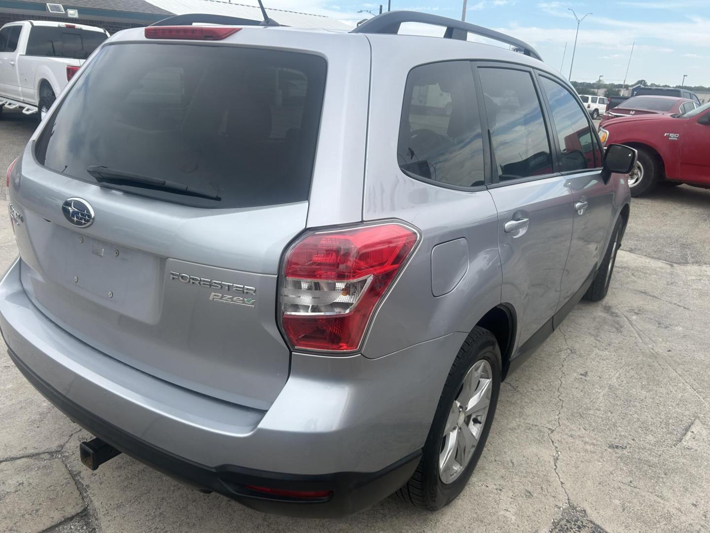 2015 Silver Subaru Forester 2.5i Premium (JF2SJAFC7FH) with an 2.5L H4 SOHC 16V engine, 6-Speed Automatic transmission, located at 1687 Business 35 S, New Braunfels, TX, 78130, (830) 625-7159, 29.655487, -98.051491 - Photo#6