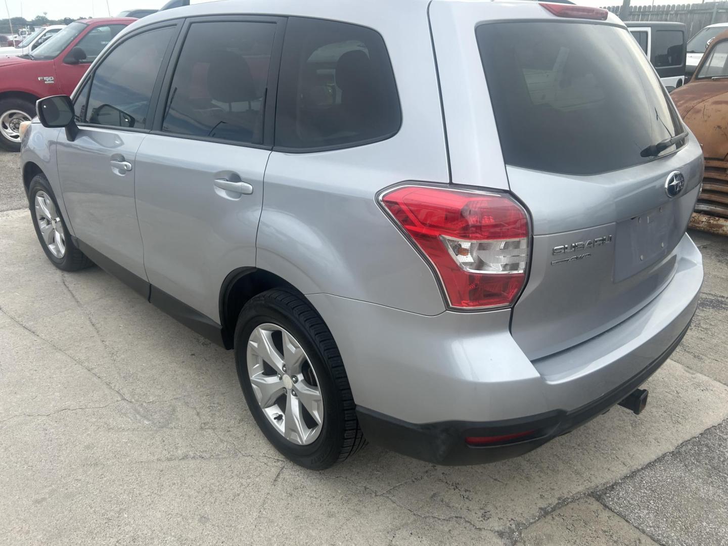 2015 Silver Subaru Forester 2.5i Premium (JF2SJAFC7FH) with an 2.5L H4 SOHC 16V engine, 6-Speed Automatic transmission, located at 1687 Business 35 S, New Braunfels, TX, 78130, (830) 625-7159, 29.655487, -98.051491 - Photo#8