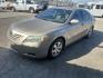 2007 Gold Toyota Camry CE 5-Spd AT (4T4BE46K07R) with an 2.4L L4 DOHC 16V engine, 5-Speed Automatic Overdrive transmission, located at 1687 Business 35 S, New Braunfels, TX, 78130, (830) 625-7159, 29.655487, -98.051491 - Photo#0