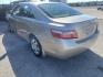 2007 Gold Toyota Camry CE 5-Spd AT (4T4BE46K07R) with an 2.4L L4 DOHC 16V engine, 5-Speed Automatic Overdrive transmission, located at 1687 Business 35 S, New Braunfels, TX, 78130, (830) 625-7159, 29.655487, -98.051491 - Photo#7