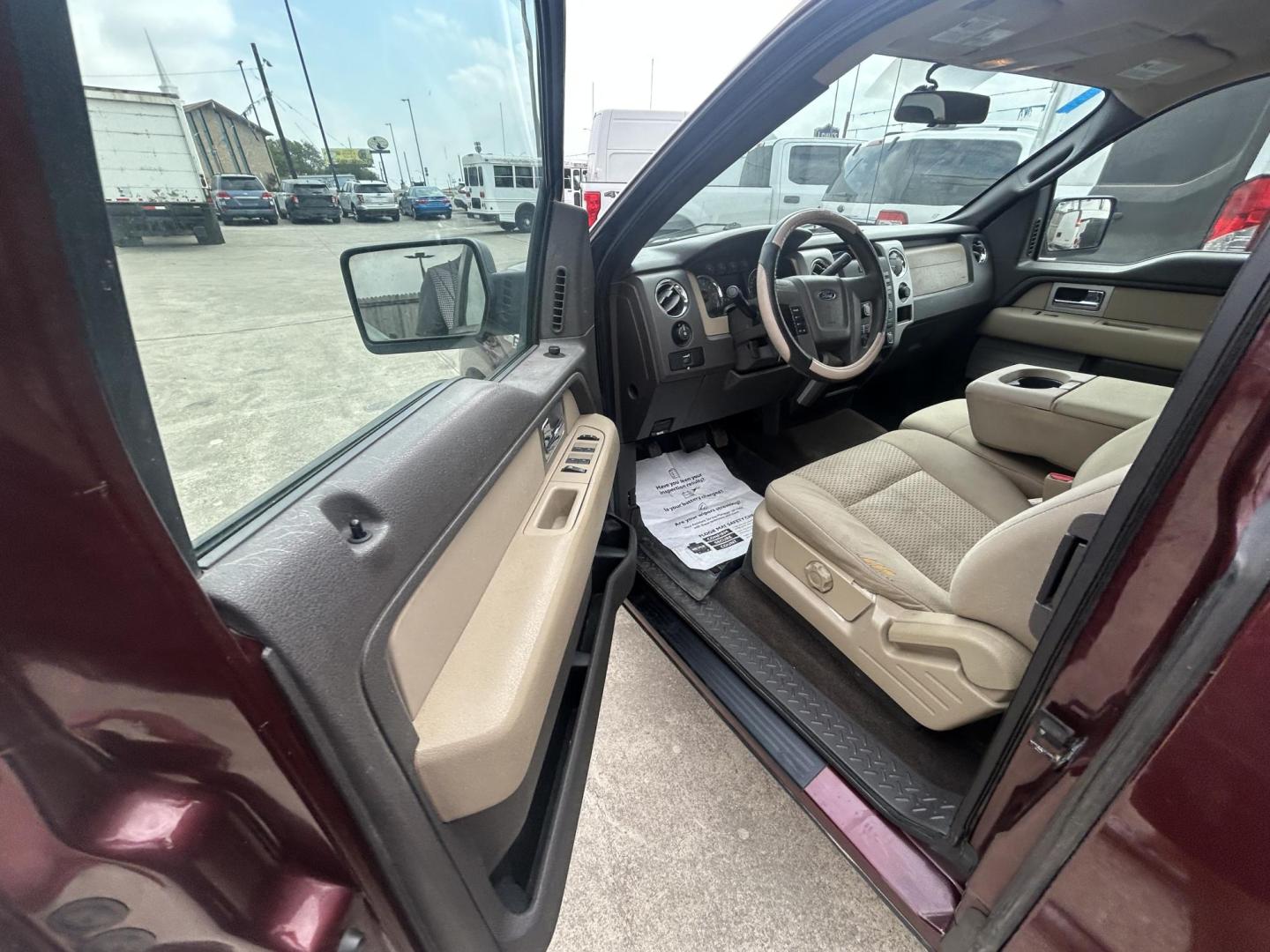 2010 Maroon Ford F-150 Lariat SuperCab 6.5-ft. Bed 2WD (1FTEX1C89AK) with an 4.6L V8 SOHC 24V engine, 4-Speed Automatic transmission, located at 1687 Business 35 S, New Braunfels, TX, 78130, (830) 625-7159, 29.655487, -98.051491 - Photo#3