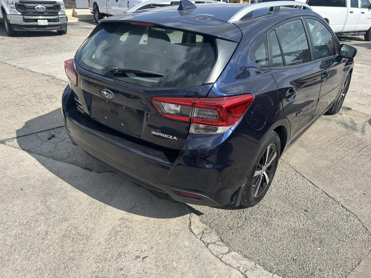 2021 Blue Subaru Impreza 2.0i Premium CVT 5-Door (4S3GTAD65M3) with an 2.0L H4 DOHC 16V engine, CVT transmission, located at 1687 Business 35 S, New Braunfels, TX, 78130, (830) 625-7159, 29.655487, -98.051491 - Photo#4