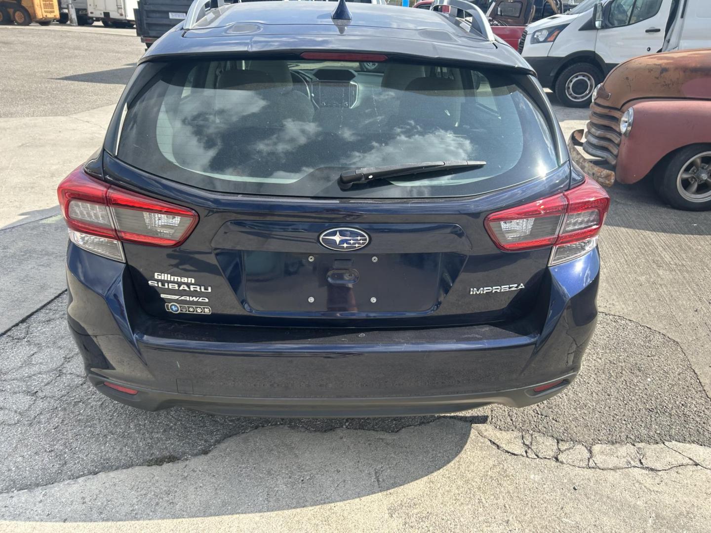 2021 Blue Subaru Impreza 2.0i Premium CVT 5-Door (4S3GTAD65M3) with an 2.0L H4 DOHC 16V engine, CVT transmission, located at 1687 Business 35 S, New Braunfels, TX, 78130, (830) 625-7159, 29.655487, -98.051491 - Photo#2