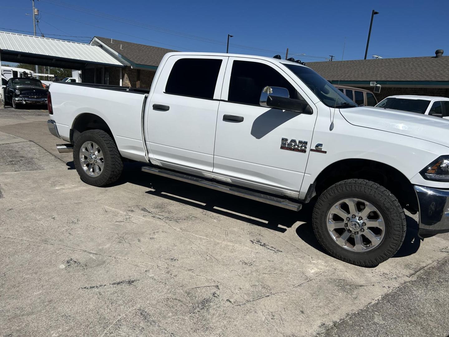 2013 White RAM 2500 Tradesman Crew Cab SWB 4WD (3C6UR5CL5DG) with an 6.7L L6 OHV 24V TURBO DIESEL engine, 6-Speed Automatic transmission, located at 1687 Business 35 S, New Braunfels, TX, 78130, (830) 625-7159, 29.655487, -98.051491 - Photo#1