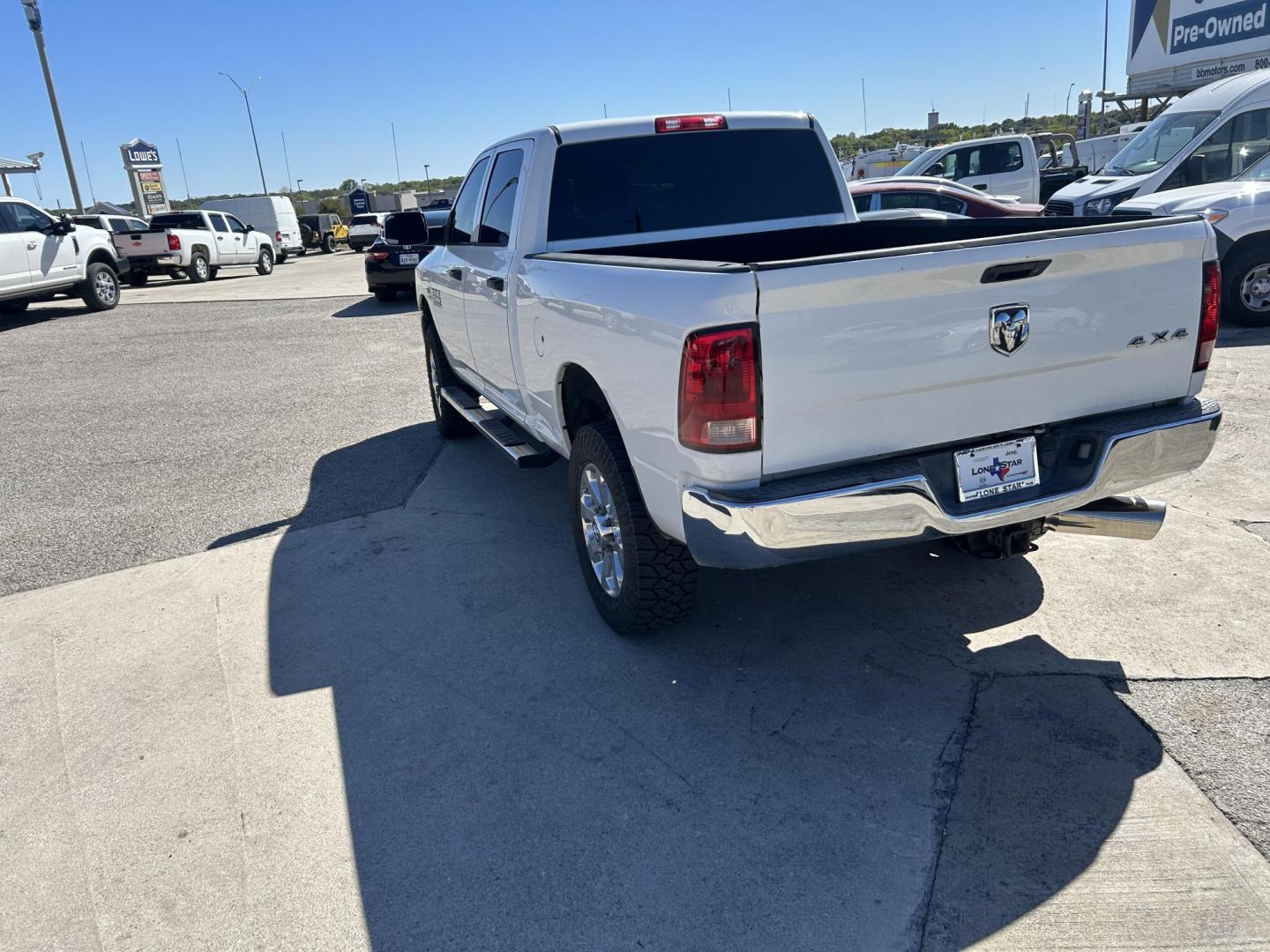 2013 White RAM 2500 Tradesman Crew Cab SWB 4WD (3C6UR5CL5DG) with an 6.7L L6 OHV 24V TURBO DIESEL engine, 6-Speed Automatic transmission, located at 1687 Business 35 S, New Braunfels, TX, 78130, (830) 625-7159, 29.655487, -98.051491 - Photo#7