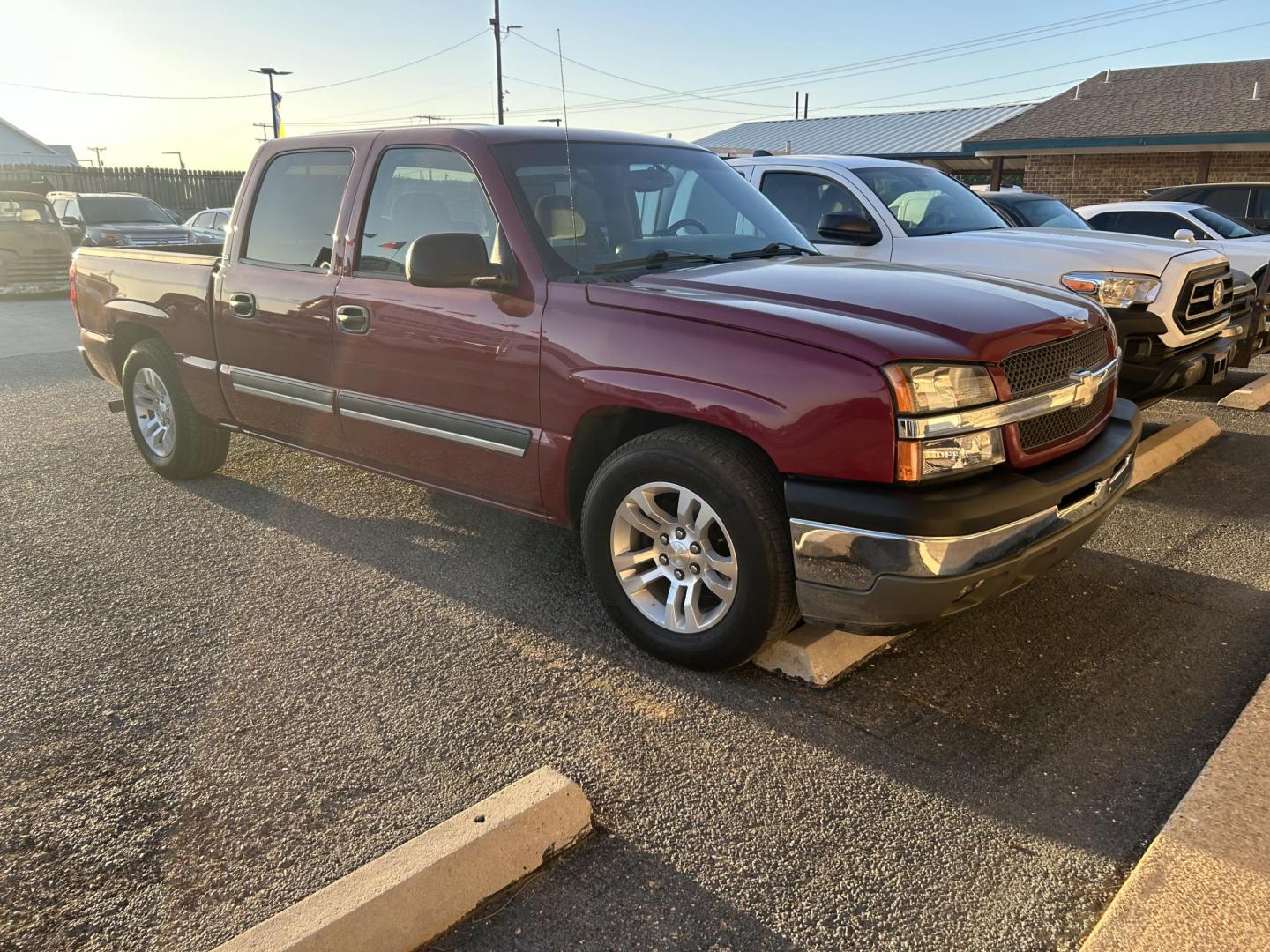 2005 Maroon Chevrolet Silverado 1500 LS Crew Cab 2WD (2GCEC13T751) with an 5.3L V8 OHV 16V engine, 4-Speed Automatic Overdrive transmission, located at 1687 Business 35 S, New Braunfels, TX, 78130, (830) 625-7159, 29.655487, -98.051491 - Photo#3