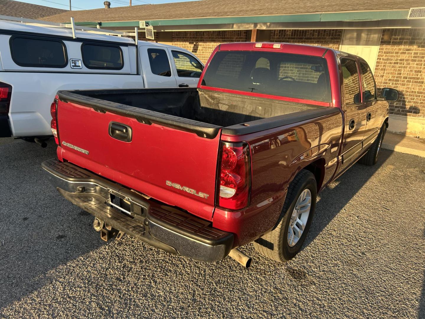 2005 Maroon Chevrolet Silverado 1500 LS Crew Cab 2WD (2GCEC13T751) with an 5.3L V8 OHV 16V engine, 4-Speed Automatic Overdrive transmission, located at 1687 Business 35 S, New Braunfels, TX, 78130, (830) 625-7159, 29.655487, -98.051491 - Photo#2