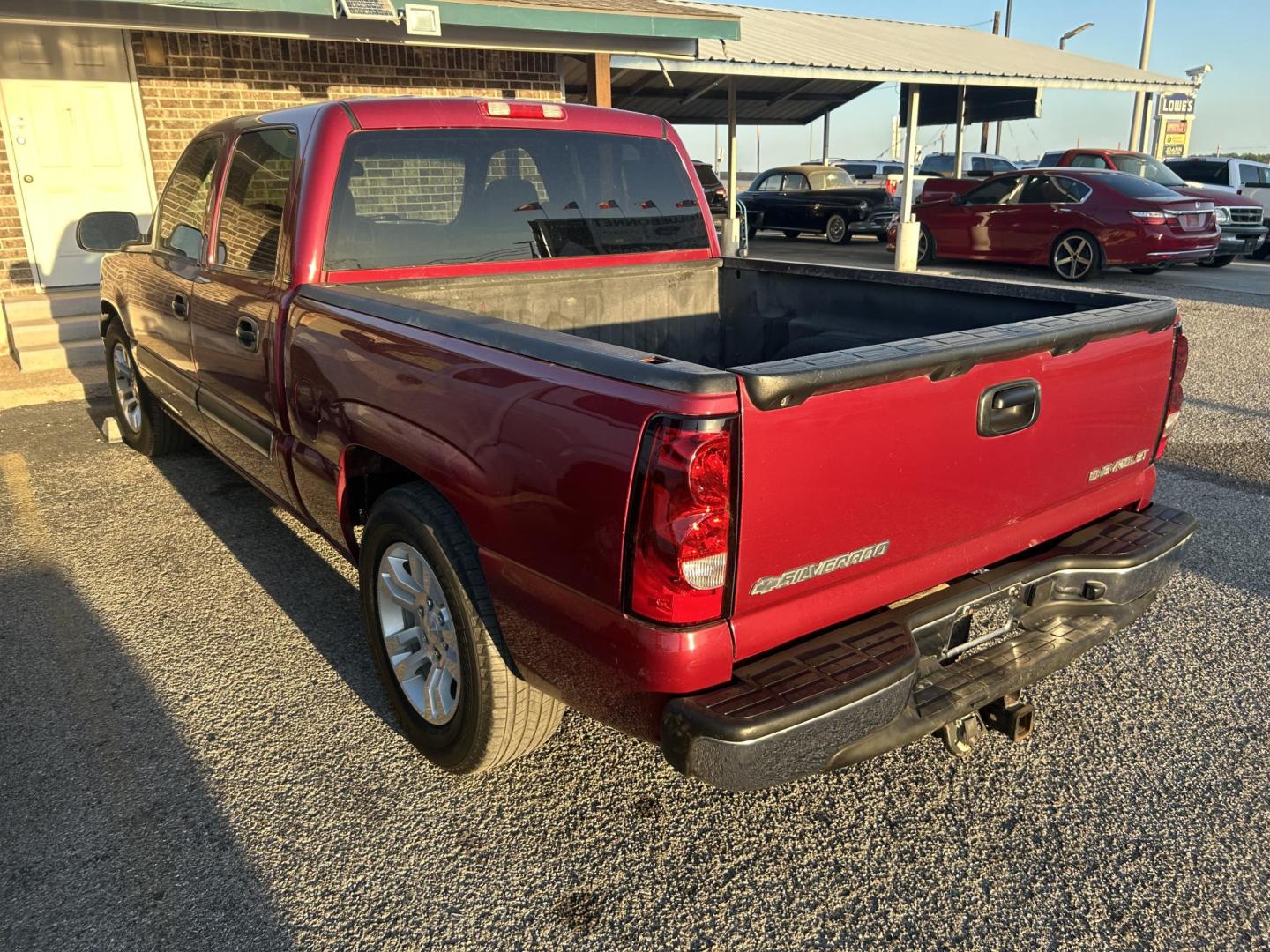 2005 Maroon Chevrolet Silverado 1500 LS Crew Cab 2WD (2GCEC13T751) with an 5.3L V8 OHV 16V engine, 4-Speed Automatic Overdrive transmission, located at 1687 Business 35 S, New Braunfels, TX, 78130, (830) 625-7159, 29.655487, -98.051491 - Photo#1
