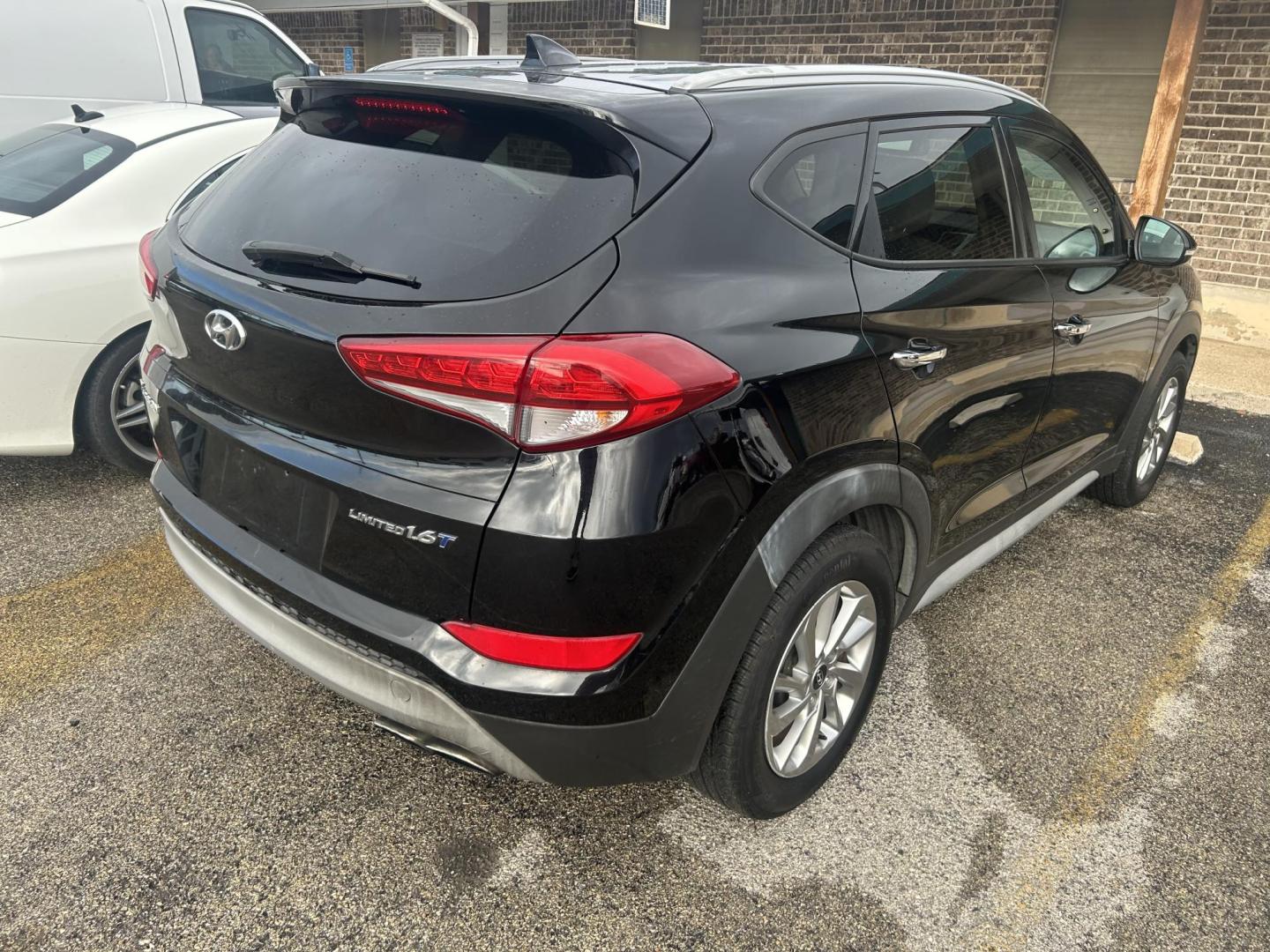 2017 Black Hyundai Tucson Eco (KM8J33A2XHU) with an 1.6L L4 DOHC 16V engine, 7A transmission, located at 1687 Business 35 S, New Braunfels, TX, 78130, (830) 625-7159, 29.655487, -98.051491 - Photo#2