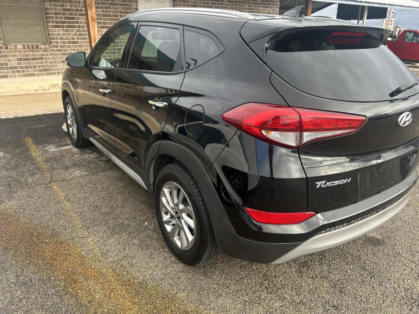 2017 Black Hyundai Tucson Eco (KM8J33A2XHU) with an 1.6L L4 DOHC 16V engine, 7A transmission, located at 1687 Business 35 S, New Braunfels, TX, 78130, (830) 625-7159, 29.655487, -98.051491 - Photo#1