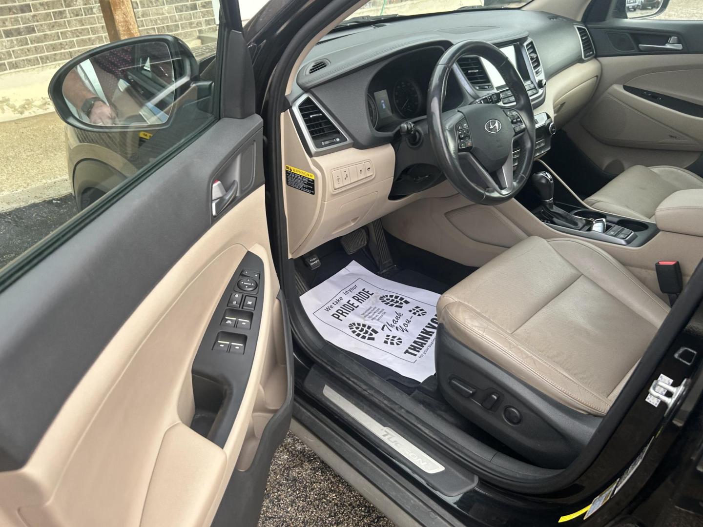 2017 Black Hyundai Tucson Eco (KM8J33A2XHU) with an 1.6L L4 DOHC 16V engine, 7A transmission, located at 1687 Business 35 S, New Braunfels, TX, 78130, (830) 625-7159, 29.655487, -98.051491 - Photo#4