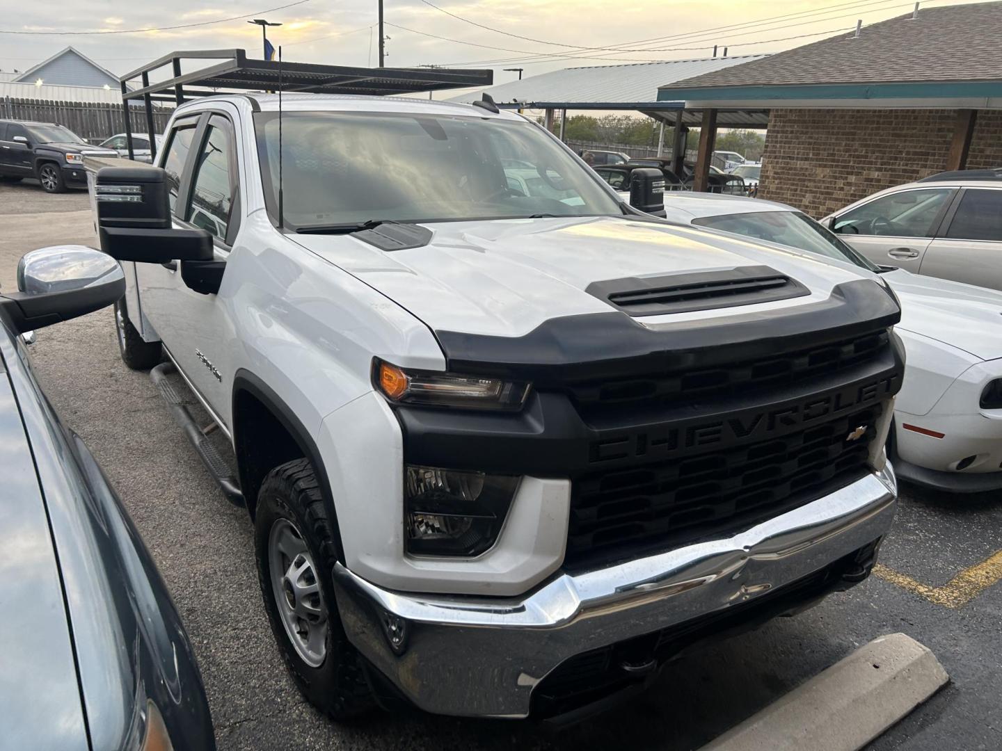 2021 White Chevrolet Silverado 2500HD Work Truck Crew Cab Short Box 2WD (1GB1WLE77MF) with an 6.6L V8 OHV 16V engine, 6A transmission, located at 1687 Business 35 S, New Braunfels, TX, 78130, (830) 625-7159, 29.655487, -98.051491 - Photo#1