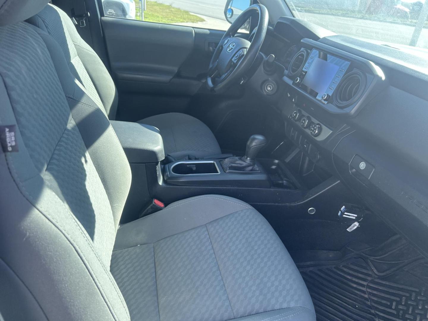 2021 White Toyota Tacoma SR5 Access Cab I4 6AT 2WD (3TYRX5GN6MT) with an 2.7L L4 DOHC 16V engine, 6A transmission, located at 1687 Business 35 S, New Braunfels, TX, 78130, (830) 625-7159, 29.655487, -98.051491 - Photo#2