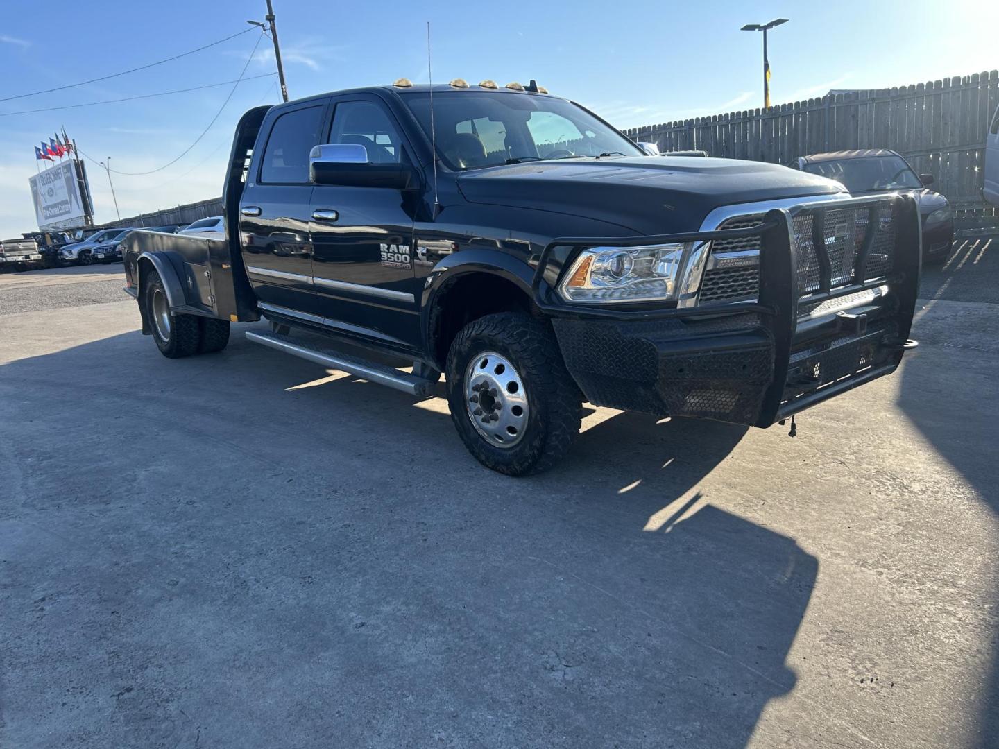 2016 Black RAM 3500 Crew Cab 4WD DRW (3C7WRTCLXGG) with an 6.7L L6 OHV 24V TURBO DIESEL engine, 6A transmission, located at 1687 Business 35 S, New Braunfels, TX, 78130, (830) 625-7159, 29.655487, -98.051491 - Photo#1