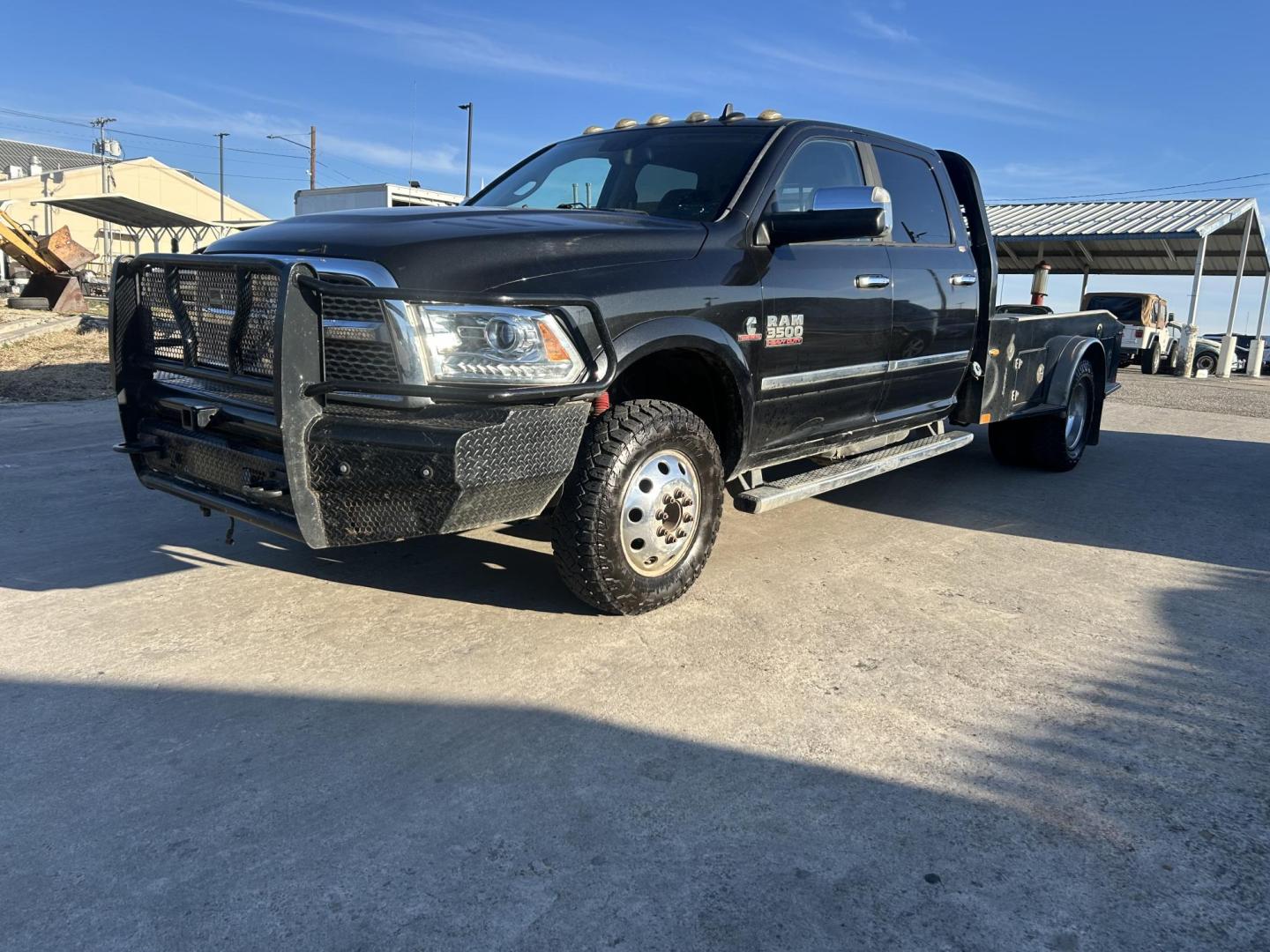 2016 Black RAM 3500 Crew Cab 4WD DRW (3C7WRTCLXGG) with an 6.7L L6 OHV 24V TURBO DIESEL engine, 6A transmission, located at 1687 Business 35 S, New Braunfels, TX, 78130, (830) 625-7159, 29.655487, -98.051491 - Photo#0