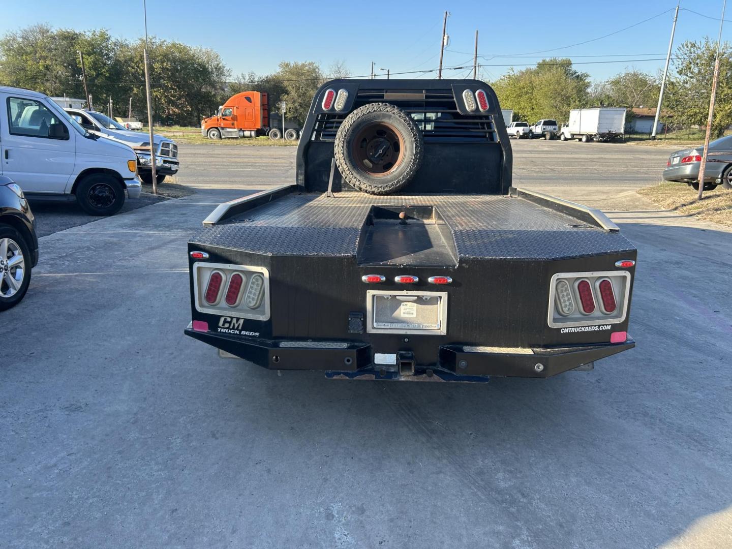 2016 Black RAM 3500 Crew Cab 4WD DRW (3C7WRTCLXGG) with an 6.7L L6 OHV 24V TURBO DIESEL engine, 6A transmission, located at 1687 Business 35 S, New Braunfels, TX, 78130, (830) 625-7159, 29.655487, -98.051491 - Photo#7