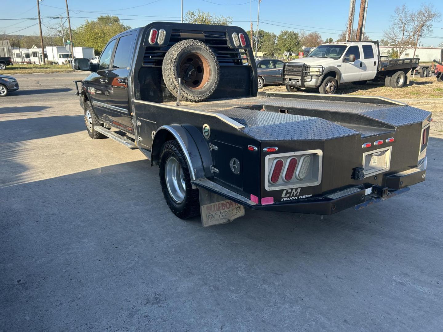 2016 Black RAM 3500 Crew Cab 4WD DRW (3C7WRTCLXGG) with an 6.7L L6 OHV 24V TURBO DIESEL engine, 6A transmission, located at 1687 Business 35 S, New Braunfels, TX, 78130, (830) 625-7159, 29.655487, -98.051491 - Photo#8