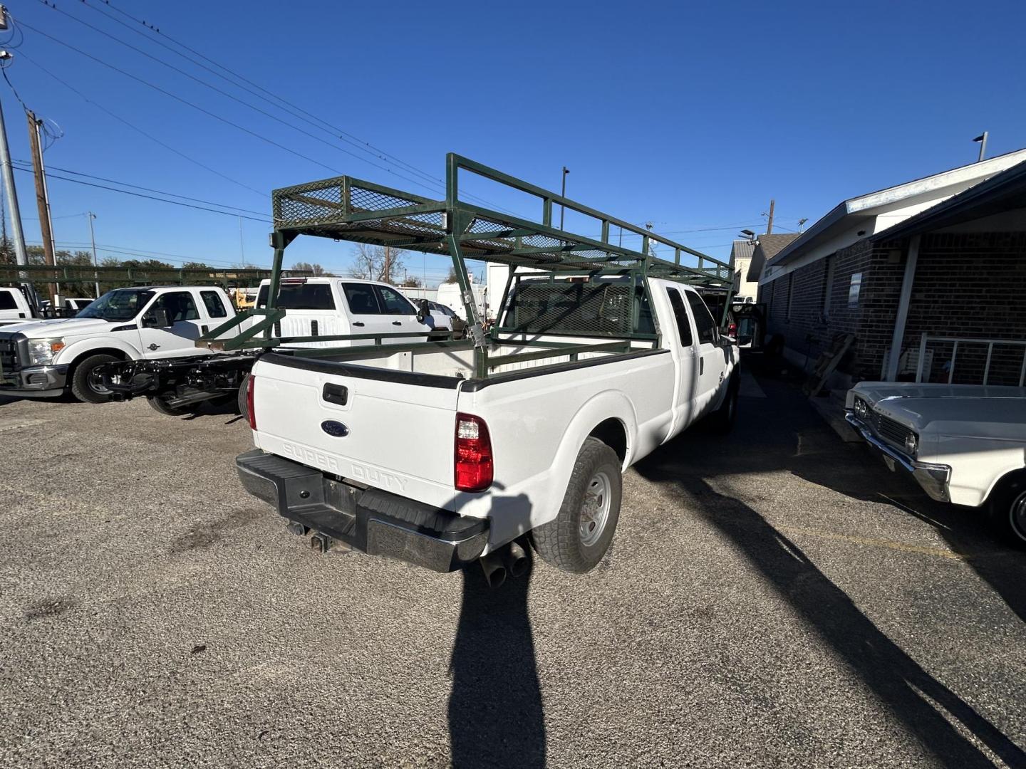 2014 White Ford F-250 SD XL SuperCab 2WD (1FT7X2AT0EE) with an 6.7L V8 OHV 16V DIESEL engine, 6-Speed Automatic transmission, located at 1687 Business 35 S, New Braunfels, TX, 78130, (830) 625-7159, 29.655487, -98.051491 - Photo#5