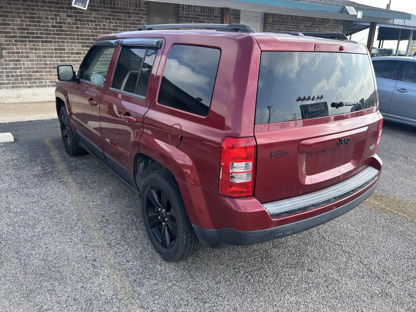 2015 Red Jeep Patriot Sport 2WD (1C4NJPBA3FD) with an 2.0L L4 DOHC 16V engine, located at 1687 Business 35 S, New Braunfels, TX, 78130, (830) 625-7159, 29.655487, -98.051491 - Photo#7