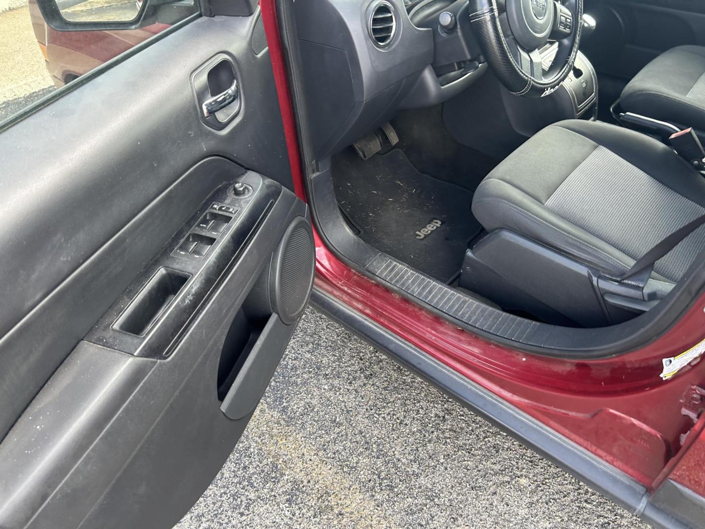 2015 Red Jeep Patriot Sport 2WD (1C4NJPBA3FD) with an 2.0L L4 DOHC 16V engine, located at 1687 Business 35 S, New Braunfels, TX, 78130, (830) 625-7159, 29.655487, -98.051491 - Photo#9