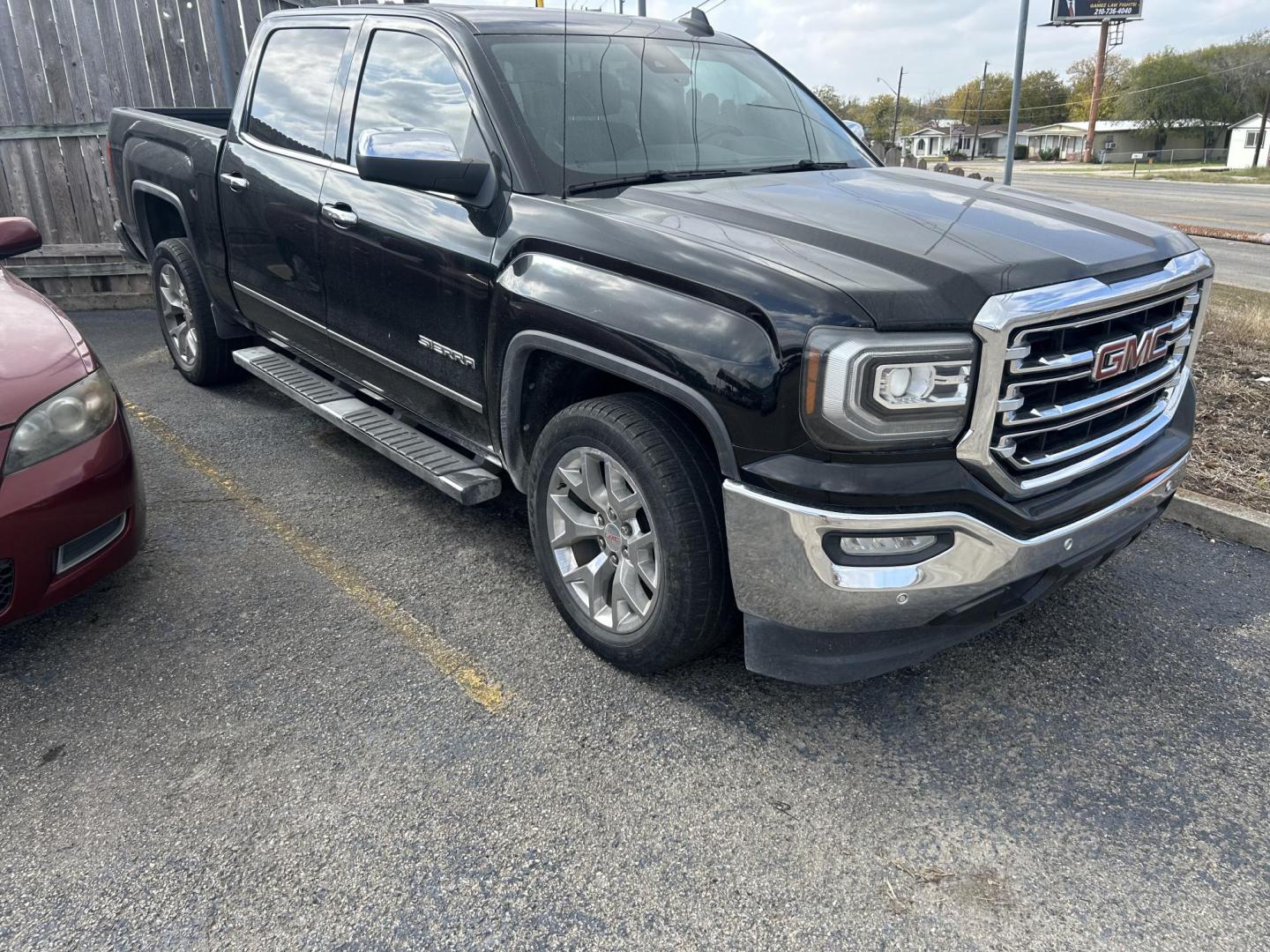 2018 Black GMC Sierra 1500 SLT Crew Cab Short Box 2WD (3GTP1NEC8JG) with an 5.3L V8 OHV 16V engine, 6A transmission, located at 1687 Business 35 S, New Braunfels, TX, 78130, (830) 625-7159, 29.655487, -98.051491 - Photo#1